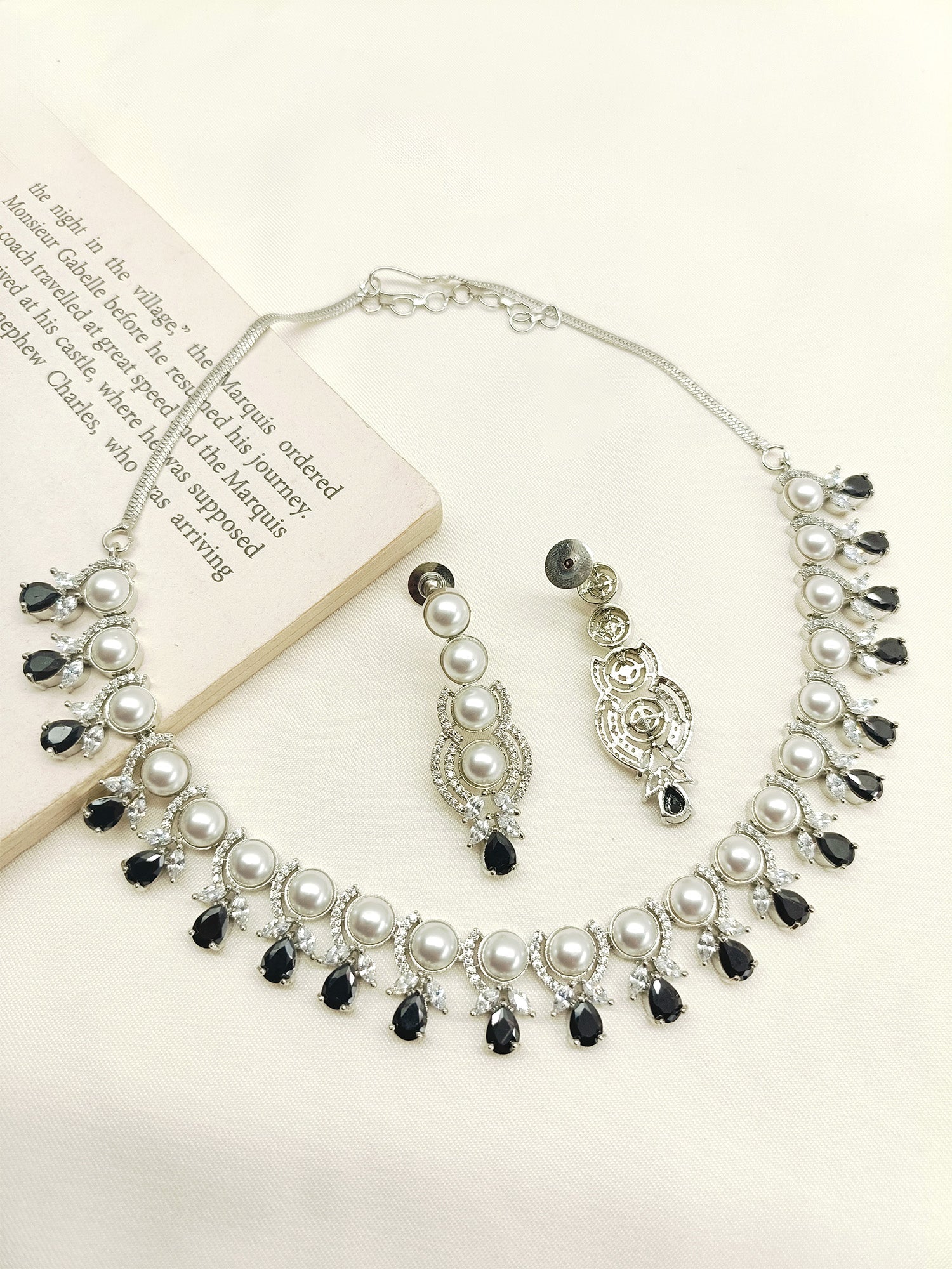 High-quality, durable necklace set with American Diamonds and pearl detailing