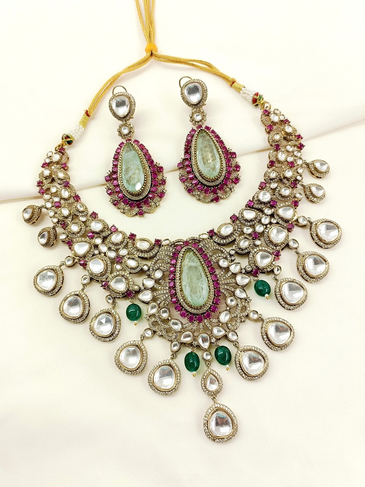 Natasha Mint Green Kundan Necklace Set - qivii