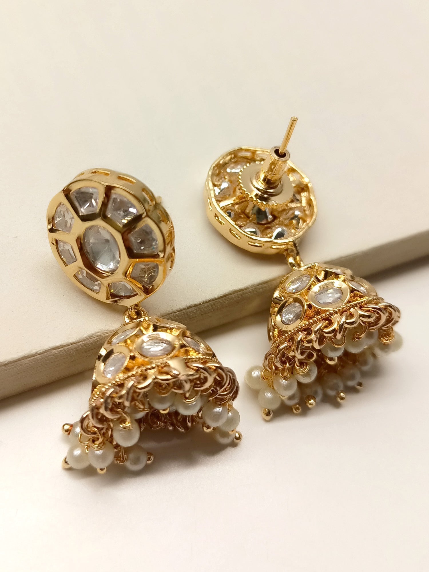 Elegant Kundan Jhumki with intricate craftsmanship to enhance your overall look