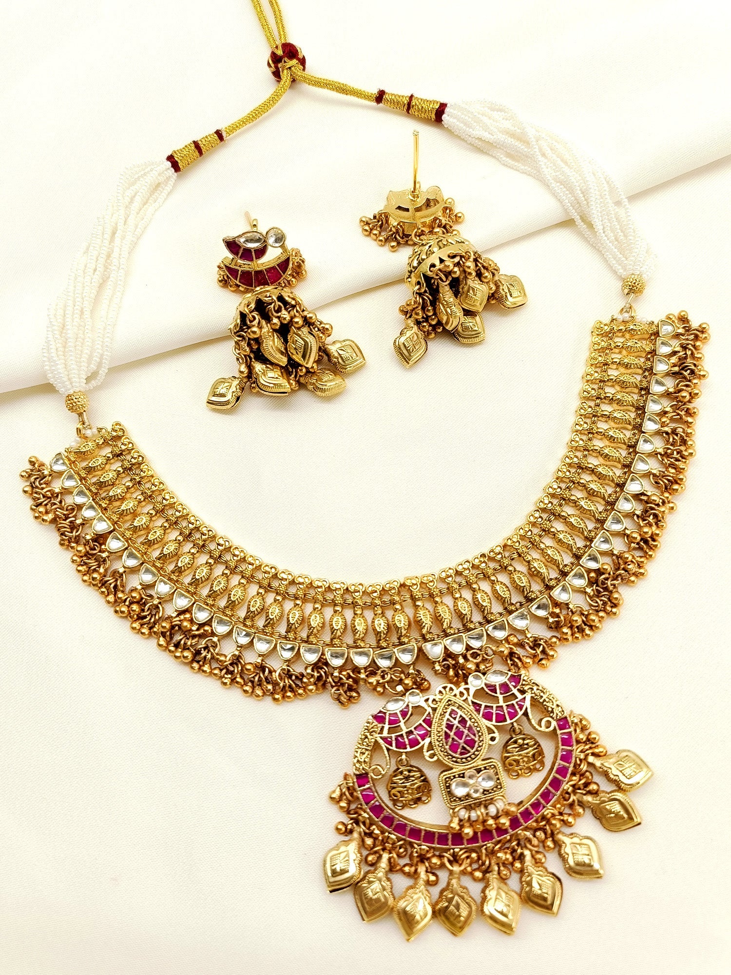 Elegant Kundan Stones Necklace Set in Antique Gold Plated Brass