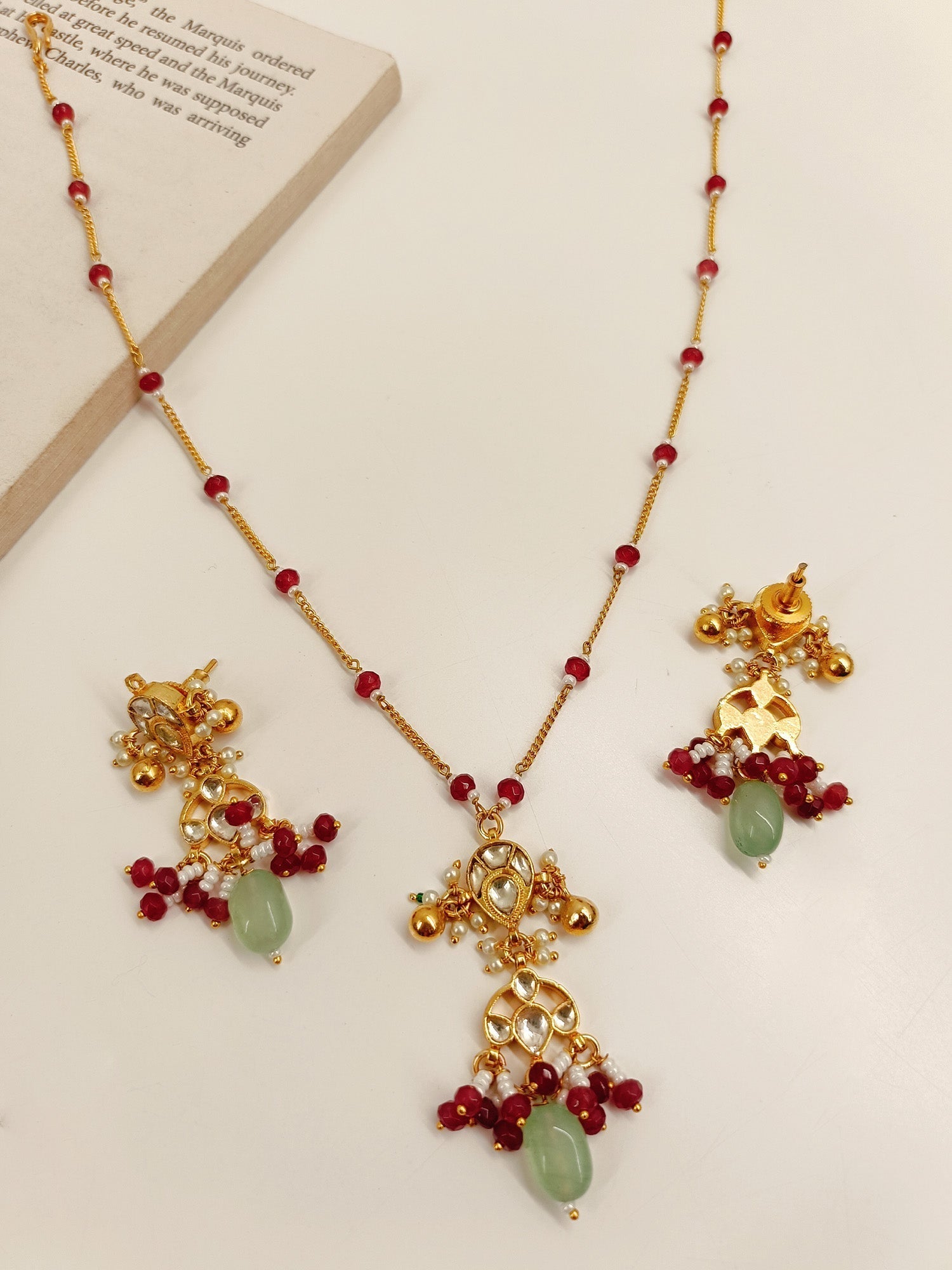 Traditional Kundan Pendant Set with elegant design and detailed craftsmanship, elevate any outfit with its sophisticated style