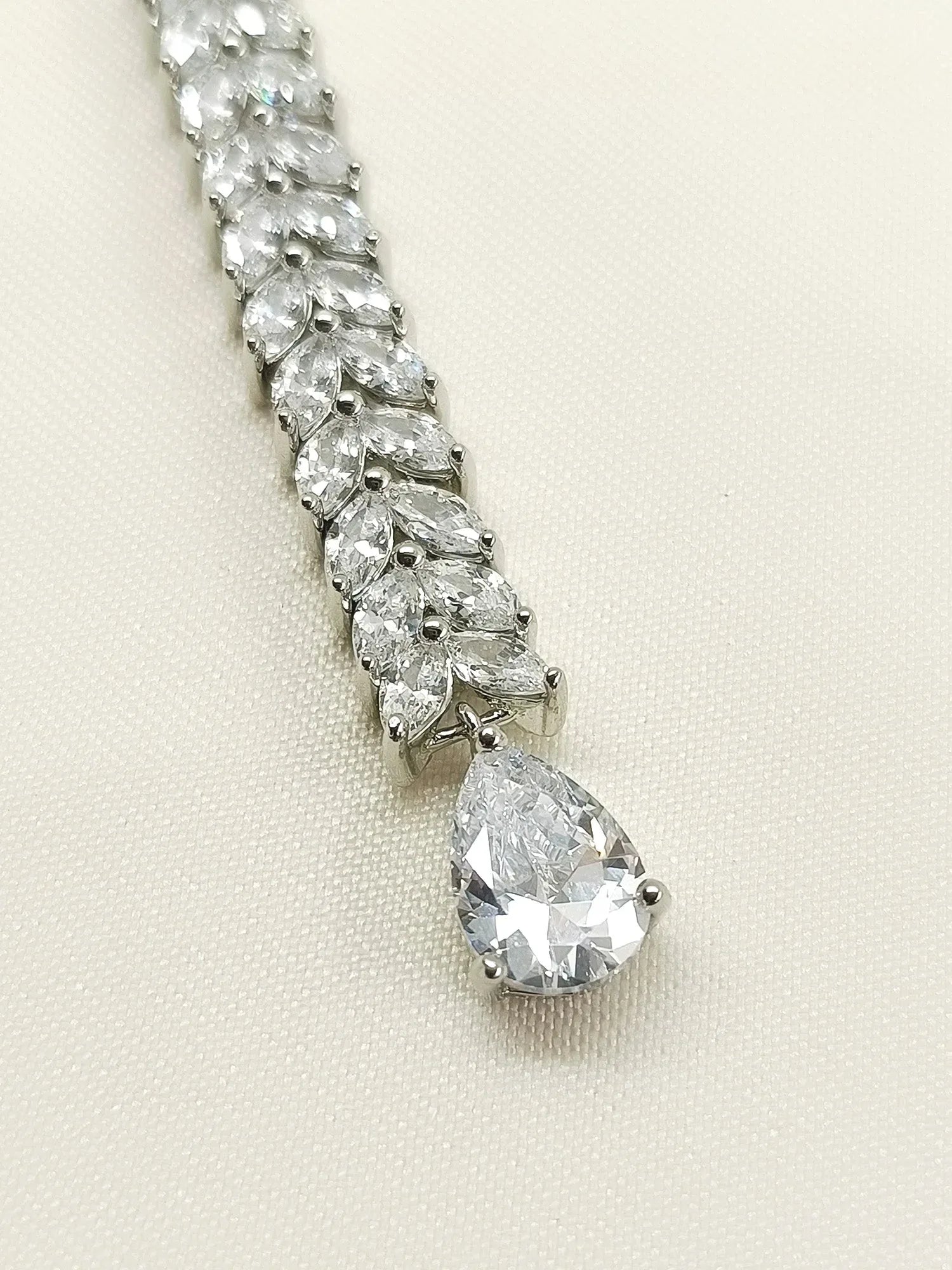 Abhistada White American Diamond Teeka