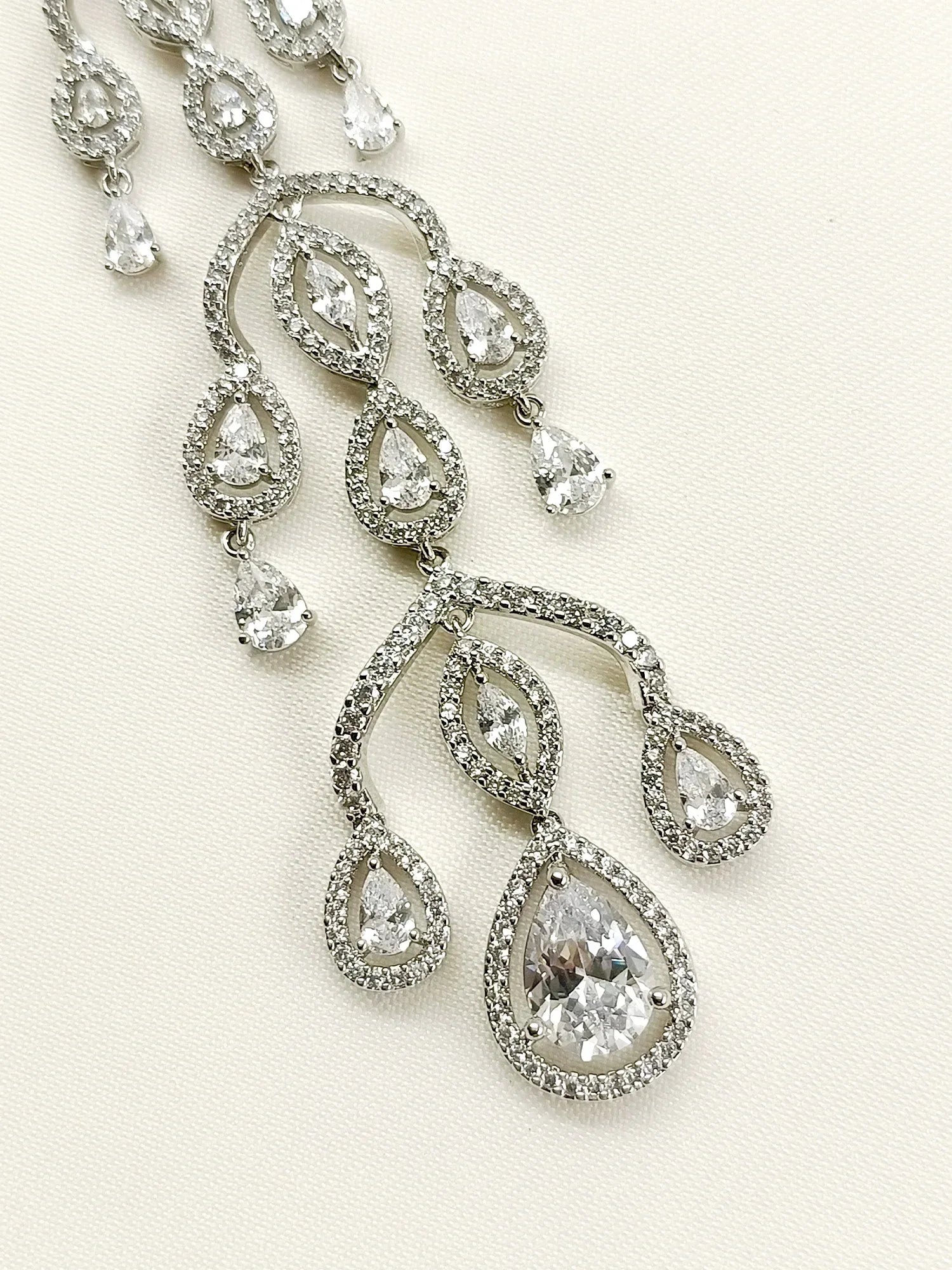 Enakshi White American Diamond Teeka