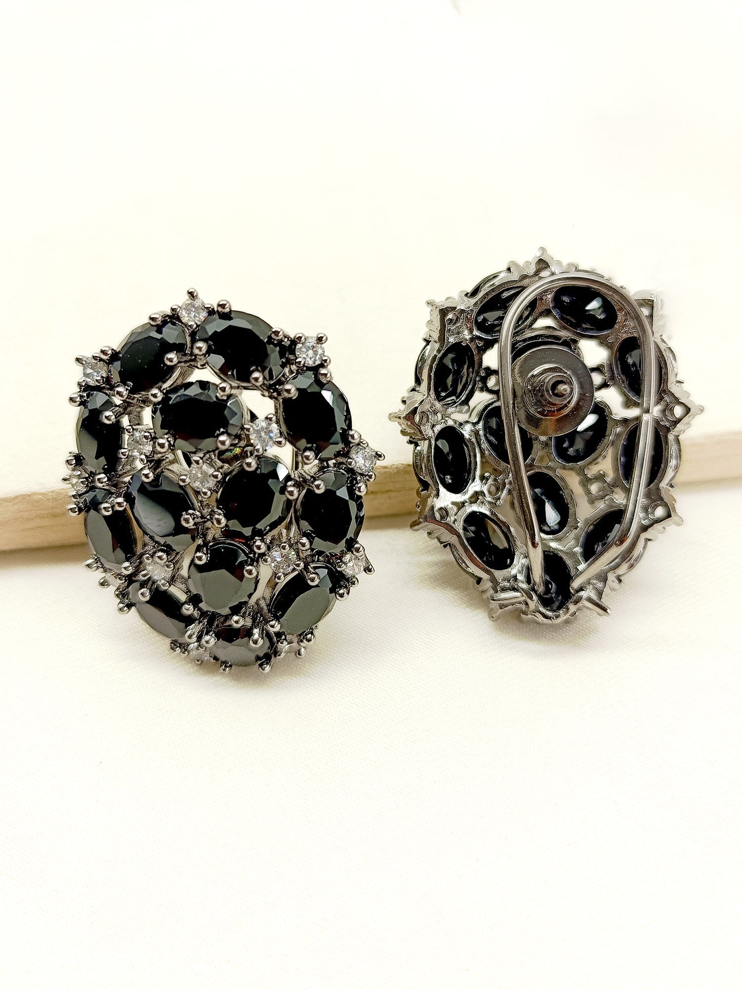 Timeless and versatile earrings made from rhodium plated brass metal, featuring stunning American diamond stones for a touch of luxury