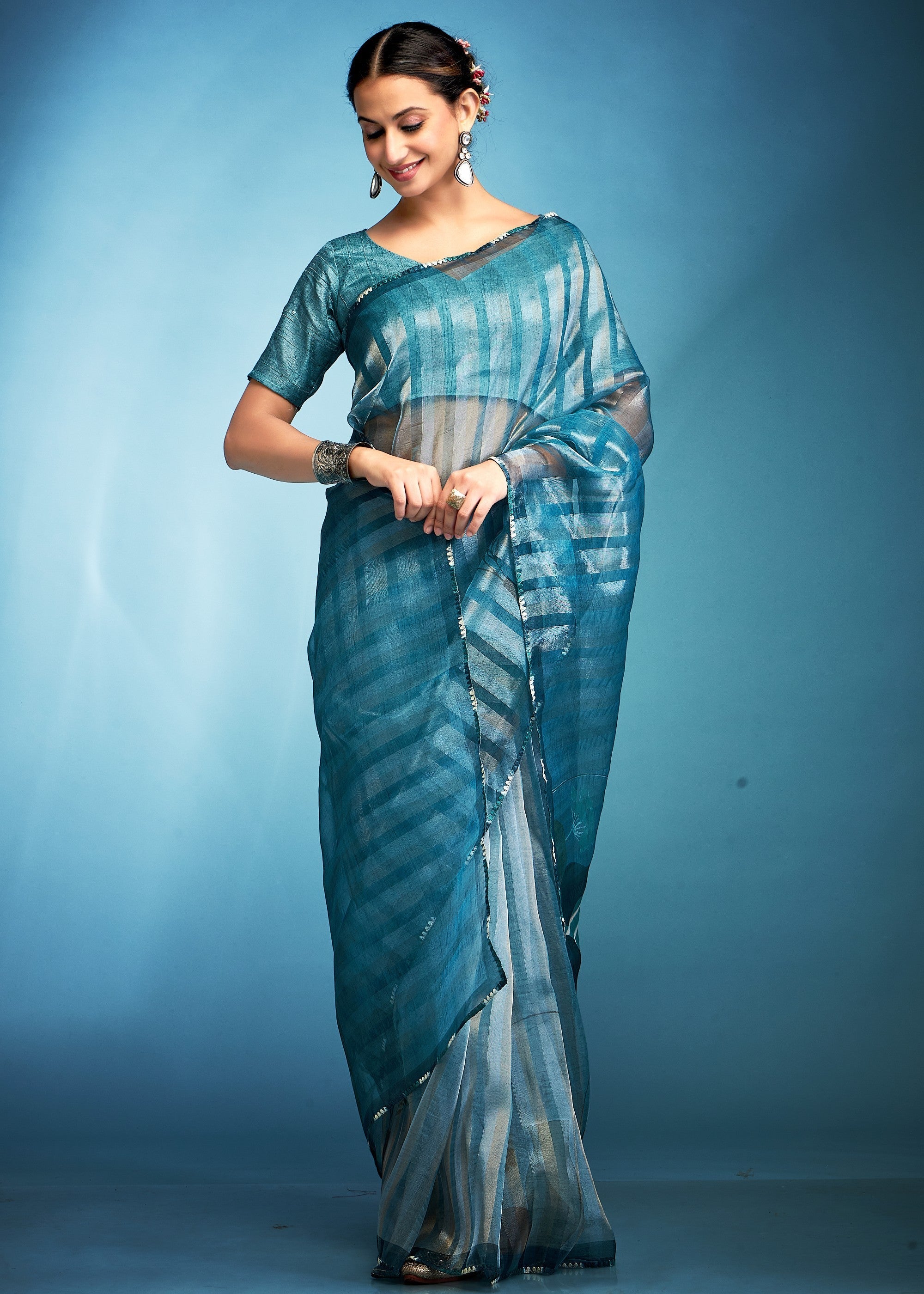 Turquoise Blue Tissue Silk Saree With Floral Print - qivii