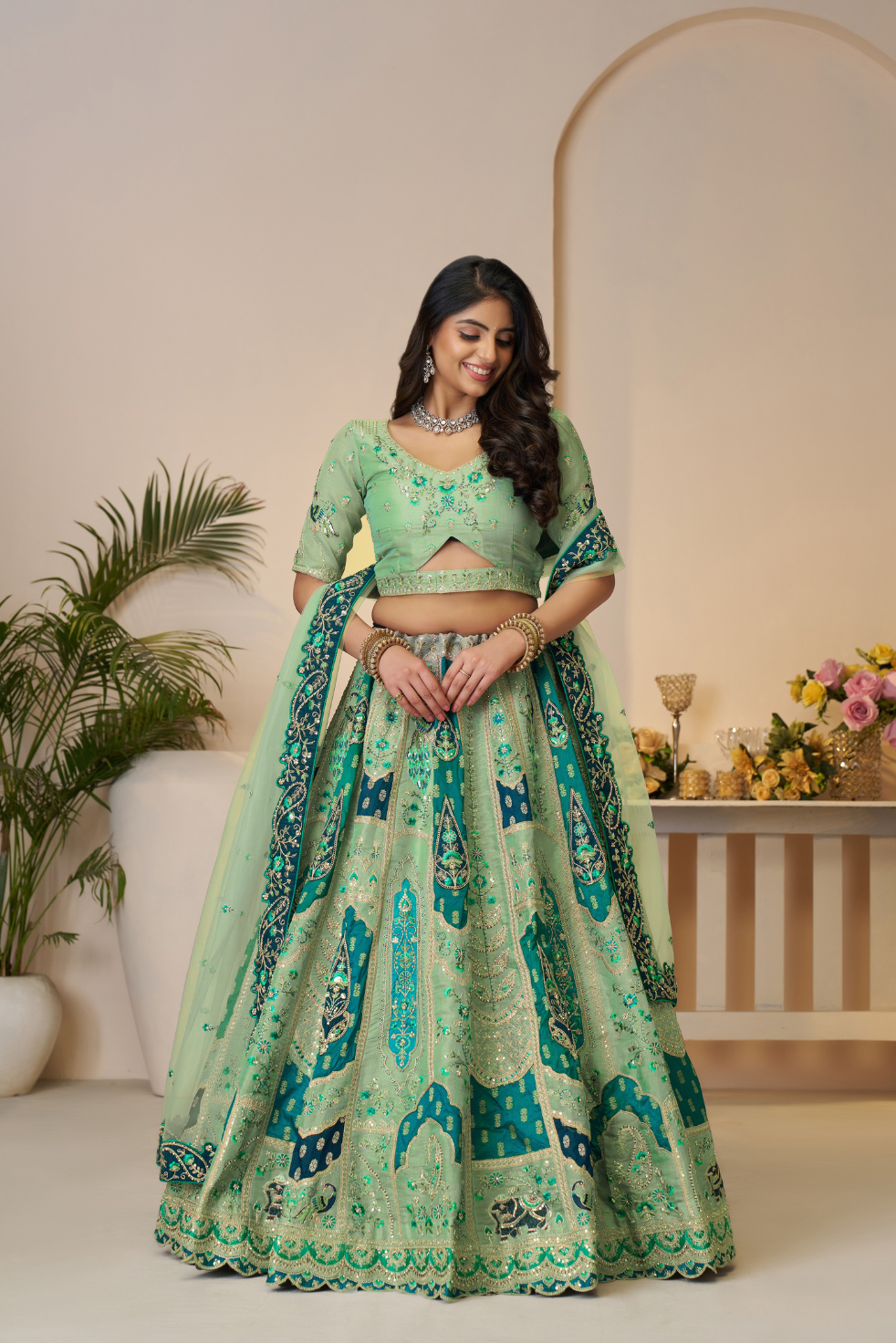 Rajsi Haathi Collection: Green Peacock-Embroidered Bridal Lehenga - qivii