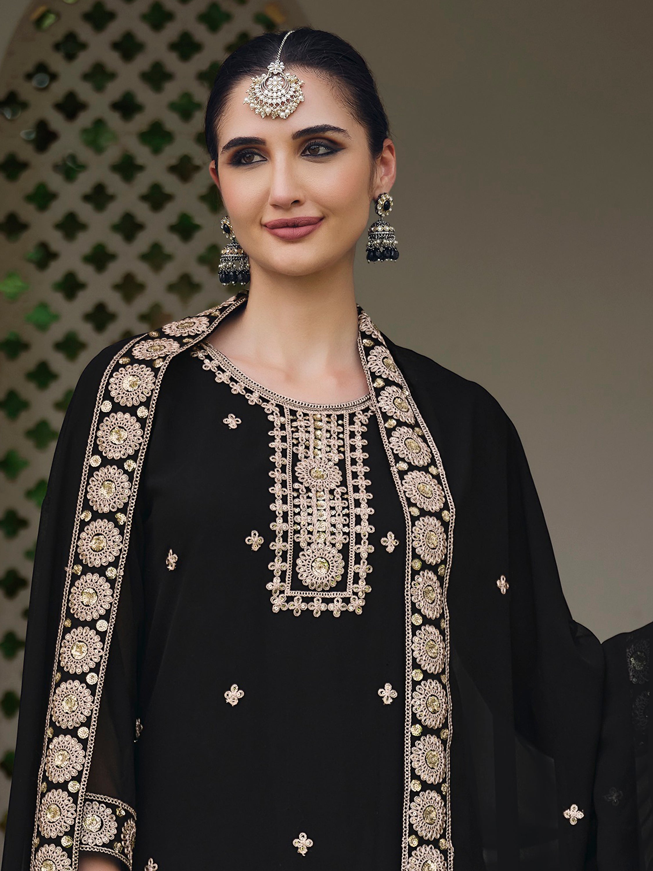 Semi-stitched black palazzo suit with sequin and embroidered lace borderwork, perfect for festivals and formal functions