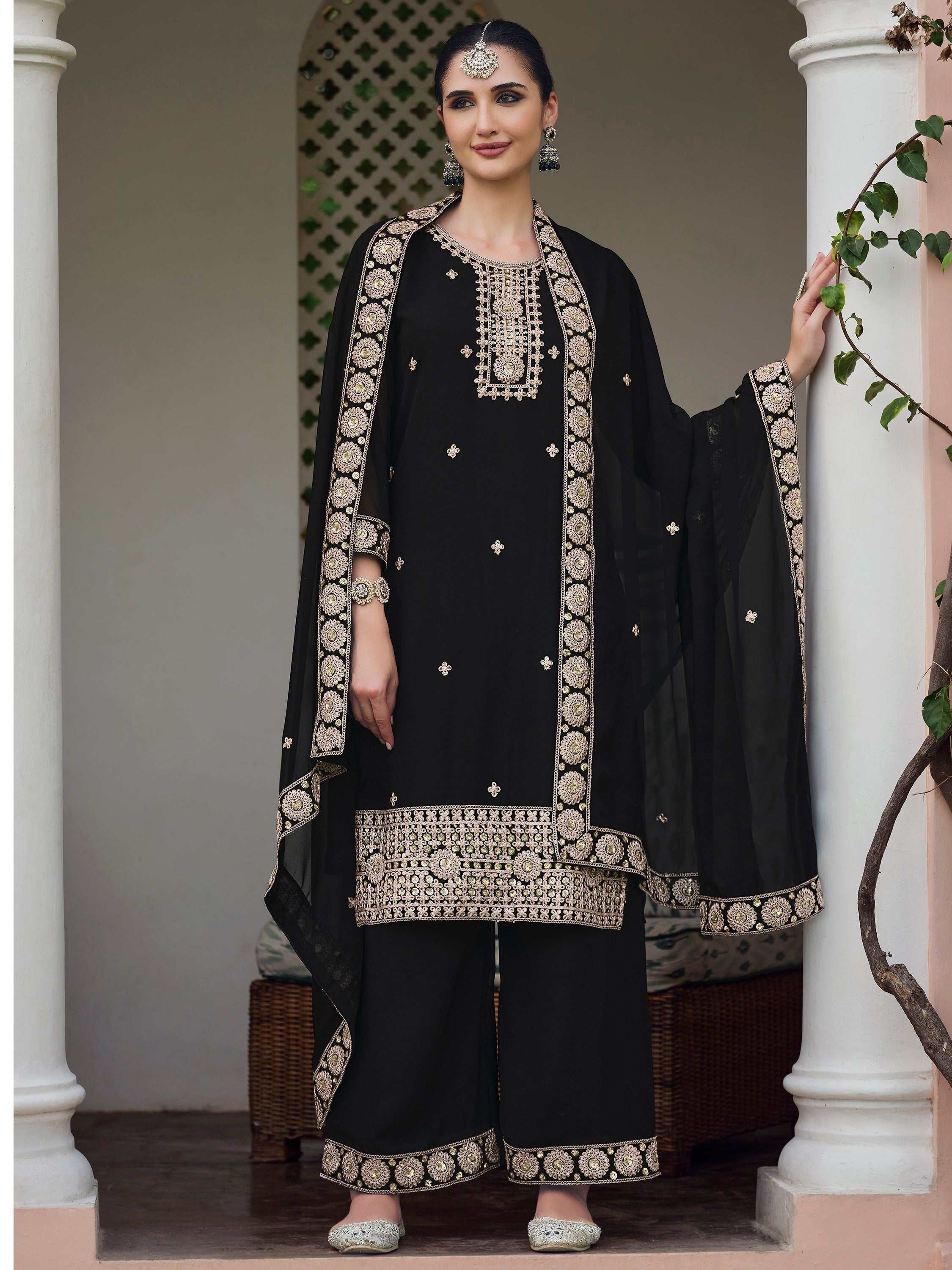 Black embroidered georgette palazzo suit with dupatta, ideal for standing out with effortless grace at any event