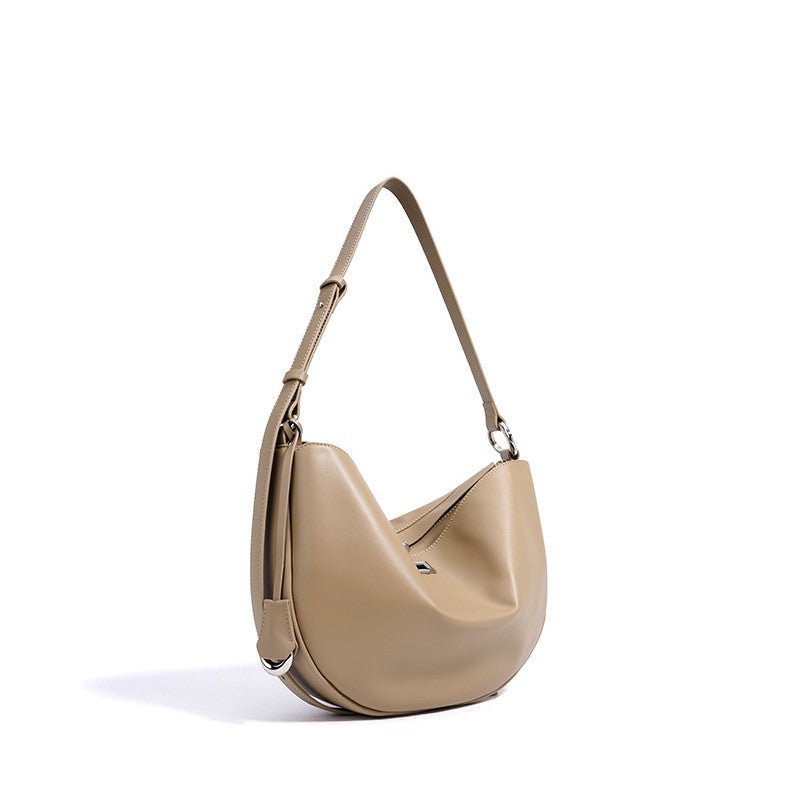 Women's Hush Rider Bucket — Genuine Leather Saddle Bag with Signature Lock Fastening & Convertible Shoulder Strap