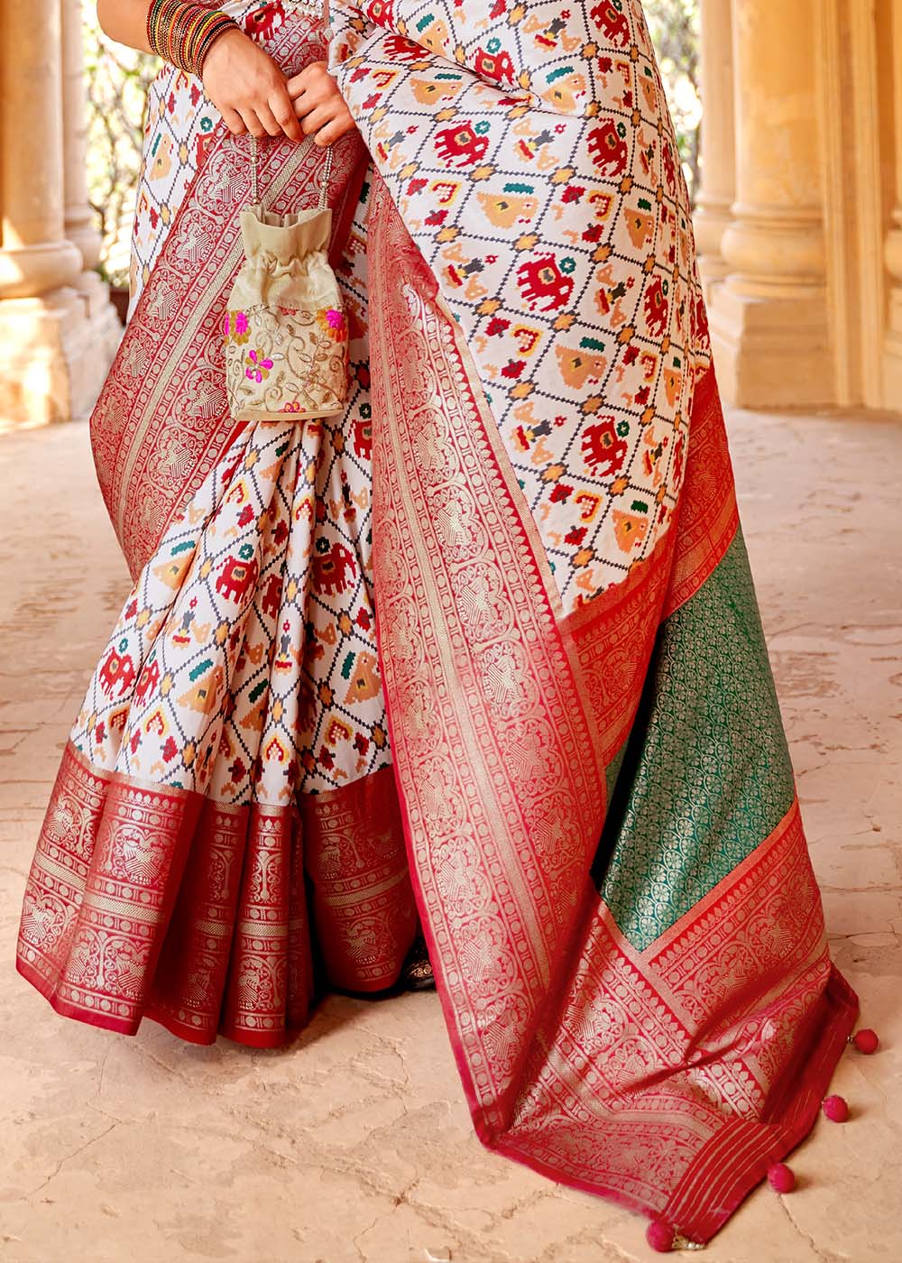 Pearl White Printed Patola Silk Saree with Zari Border & Tassels on Pallu - qivii
