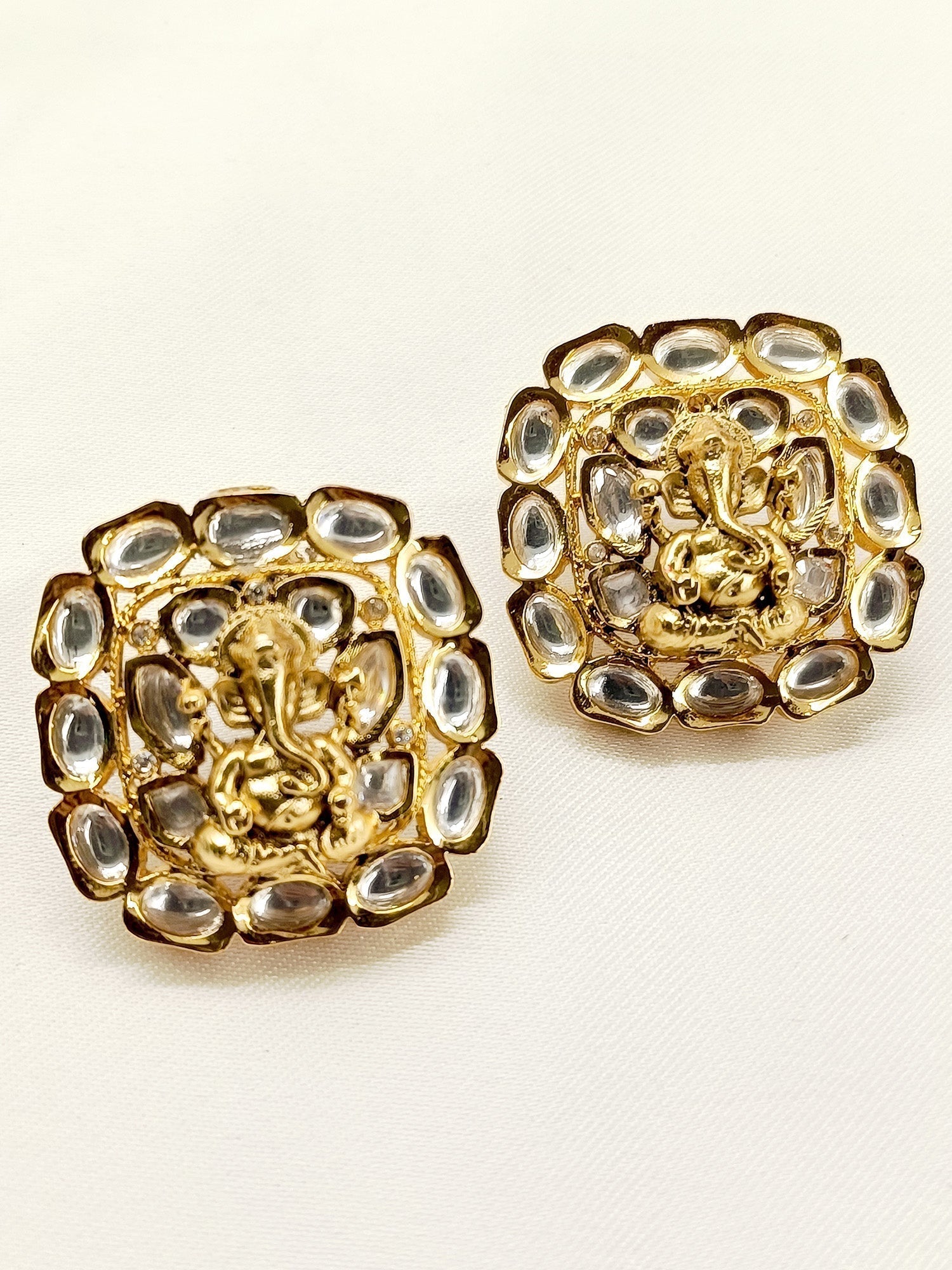 Beautiful Kamari White Ganesh Ji Kundan Tops with intricate detailing