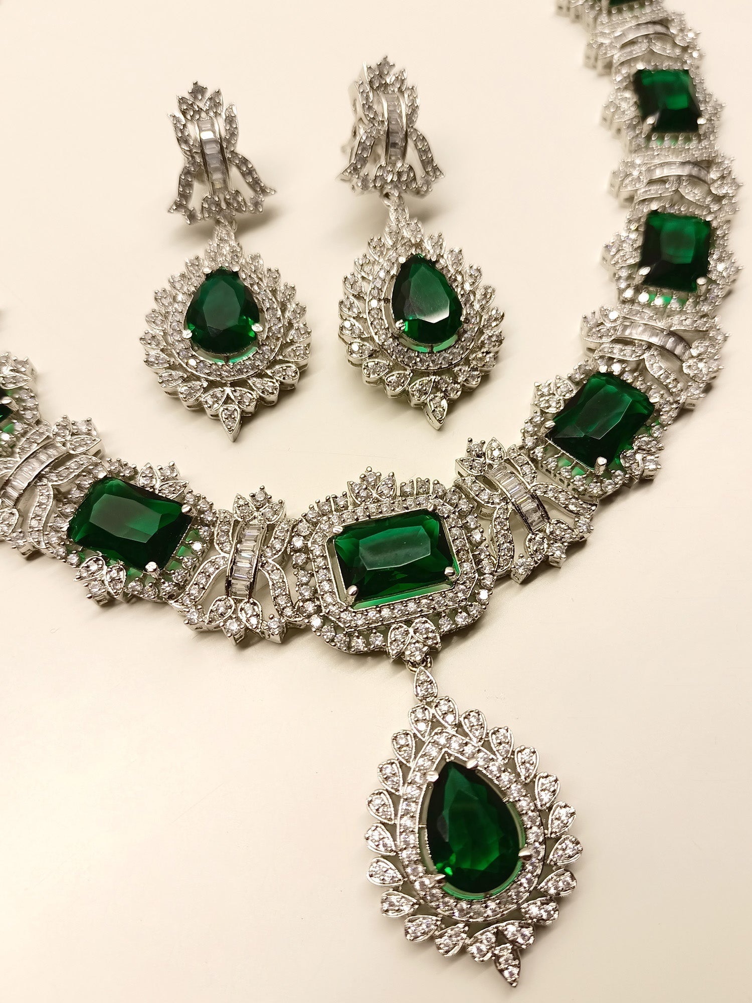 Eye-catching and elegant green American diamond necklace set