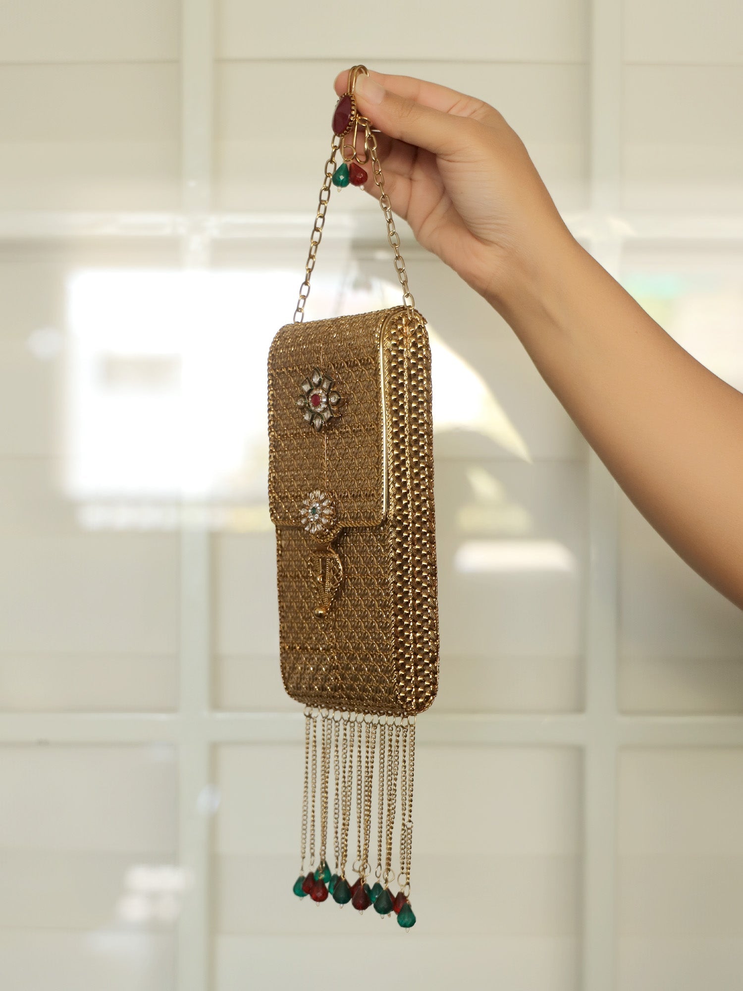 Shristi Golden Mobile Pouch - qivii