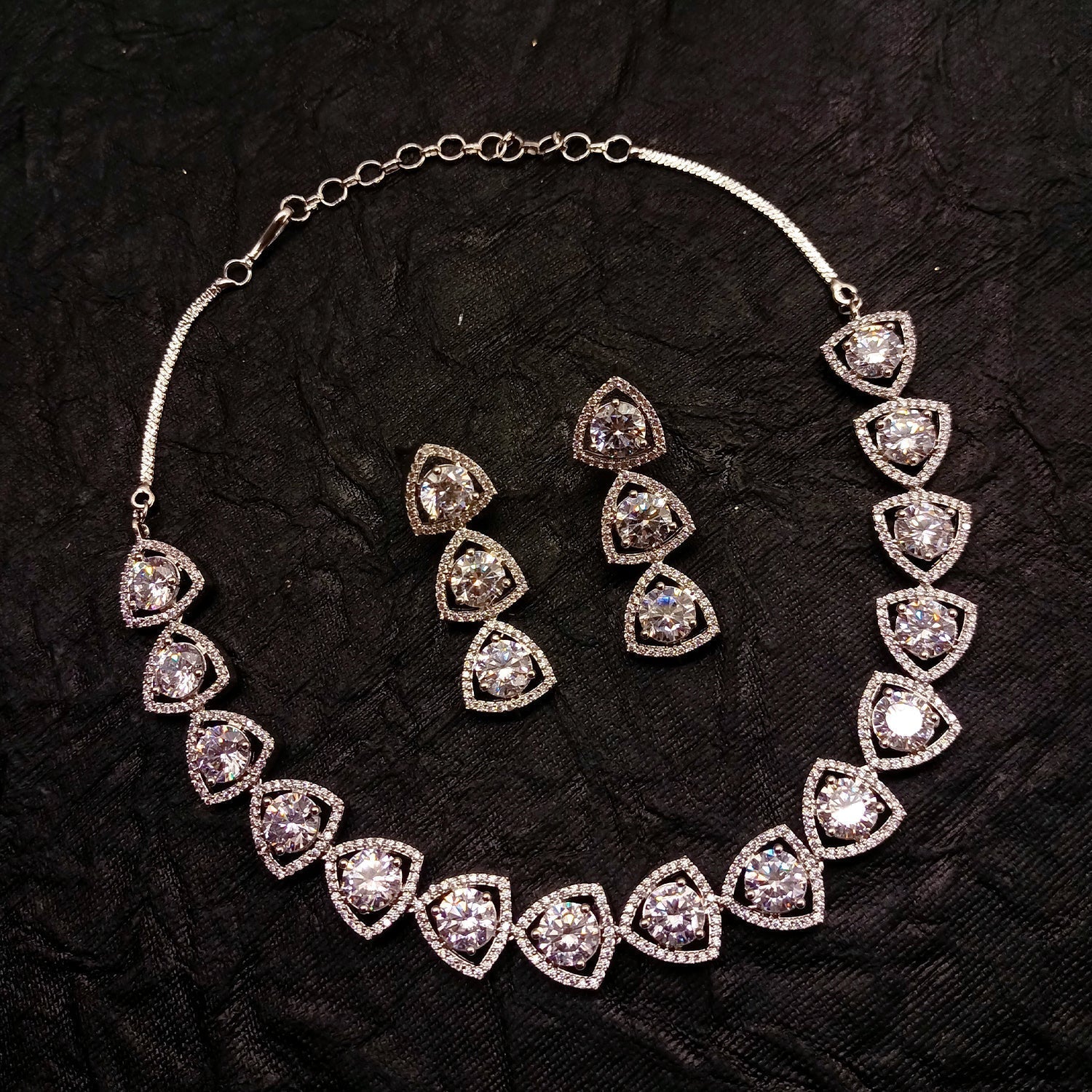 Stunning Zaara Silver Plated Semiprecious White Stone American Diamond set crafted with intricate silver plating and sparkling white stones