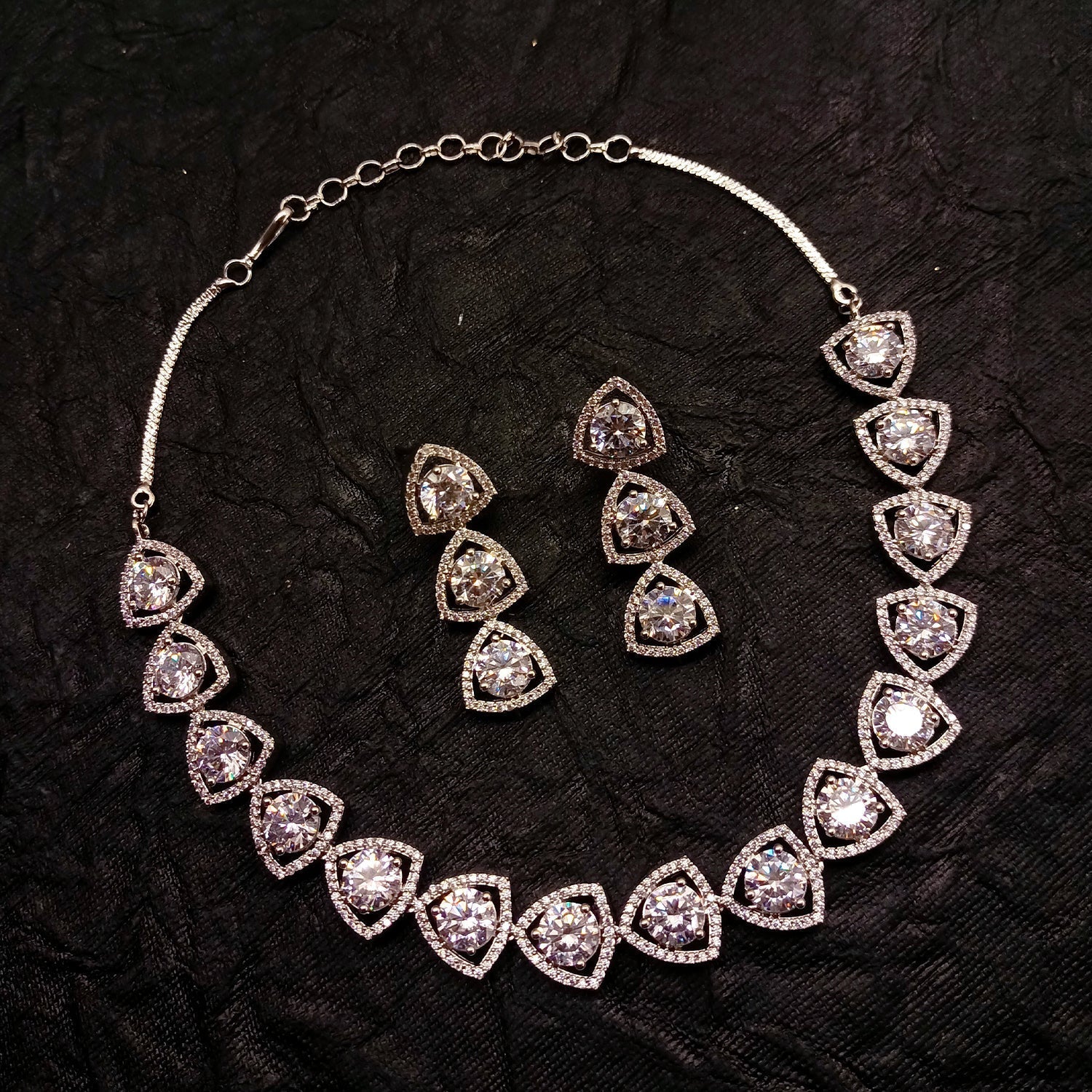 Stunning Zaara Silver Plated Semiprecious White Stone American Diamond set crafted with intricate silver plating and sparkling white stones