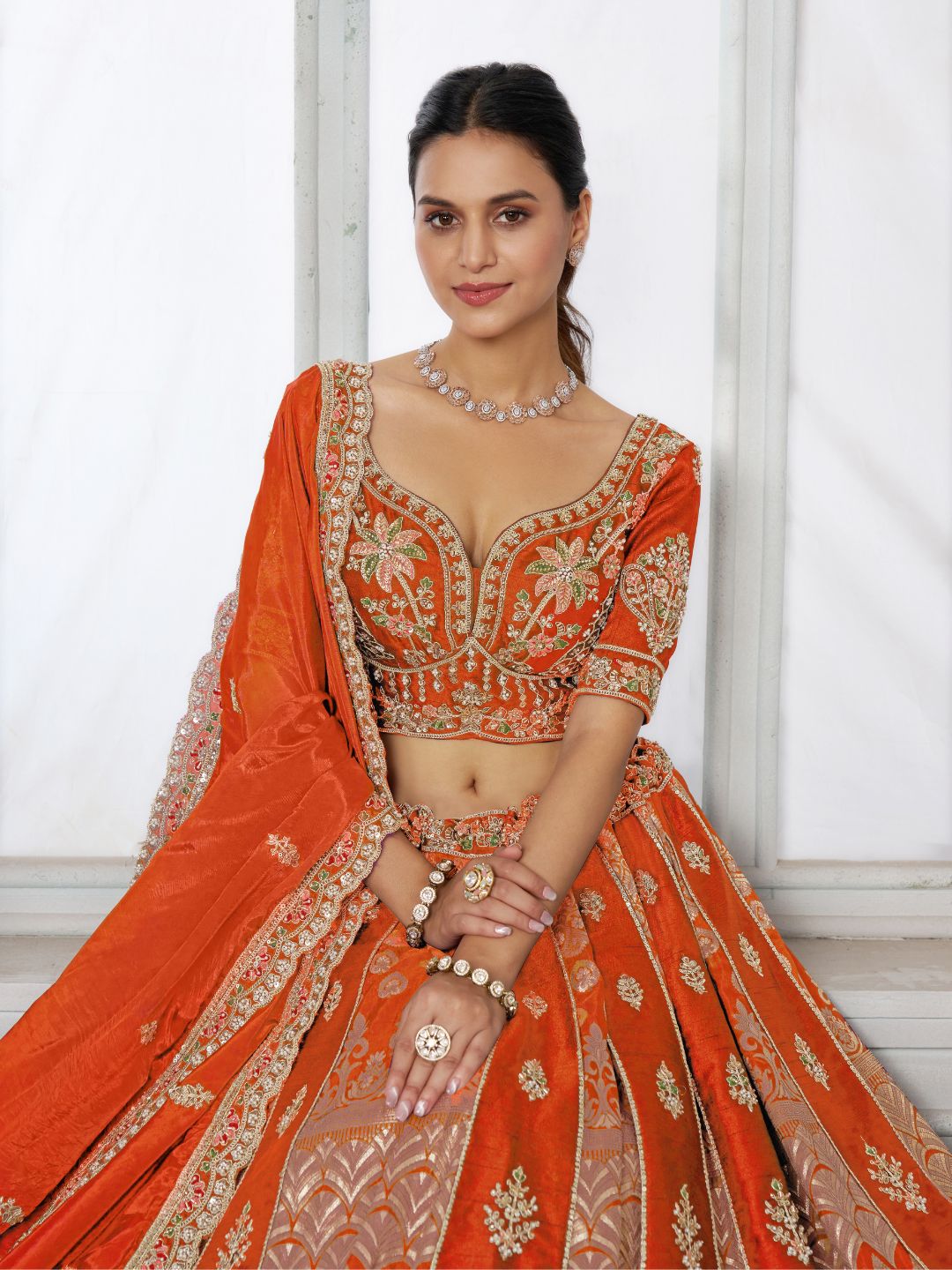 Elegant Rust Lehenga Featuring Rich Raw Silk and Artisan Craftsmanship