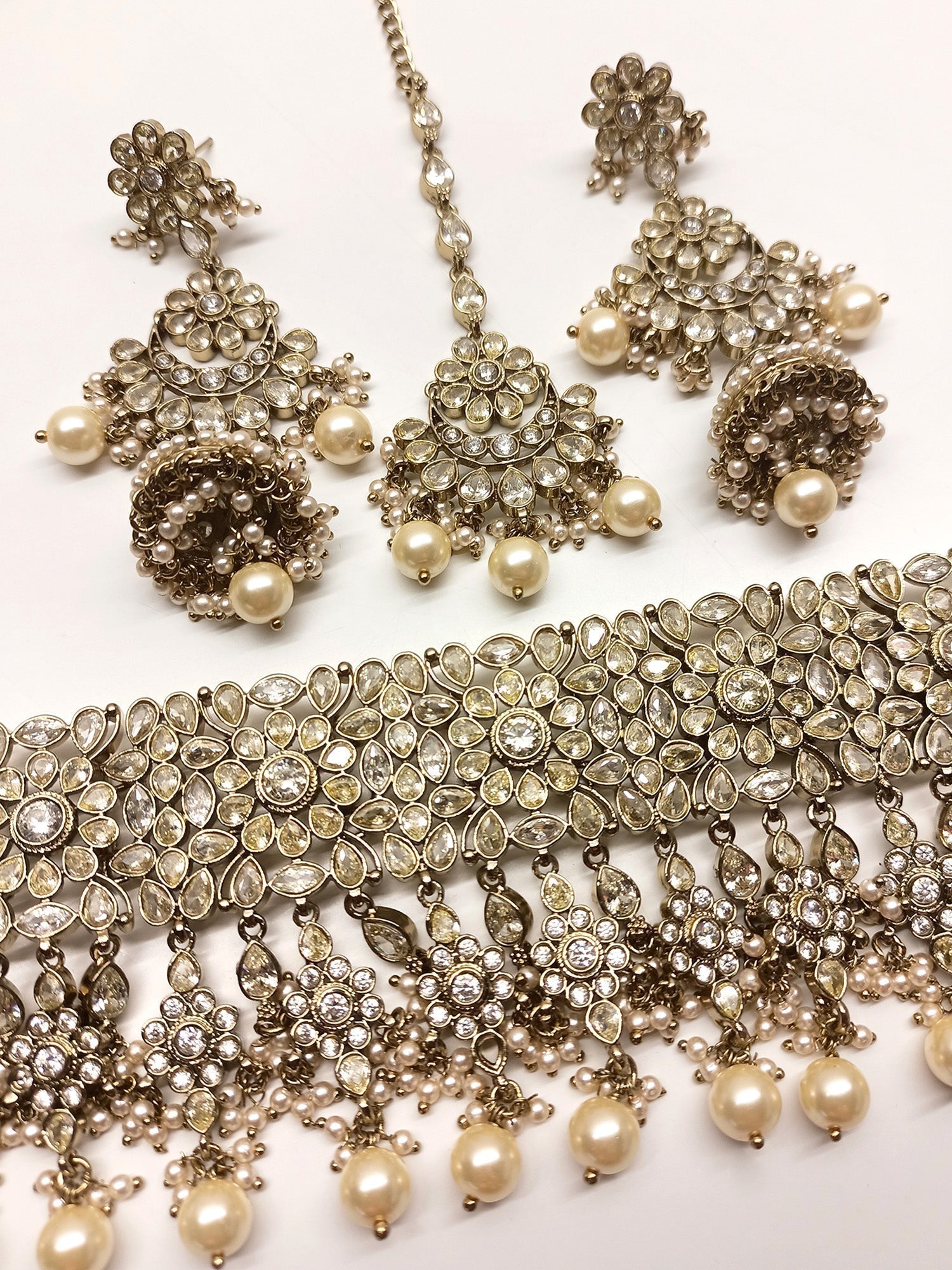 Timeless and On-trend Tasavur Copper Polki Choker Set for Special Occasions