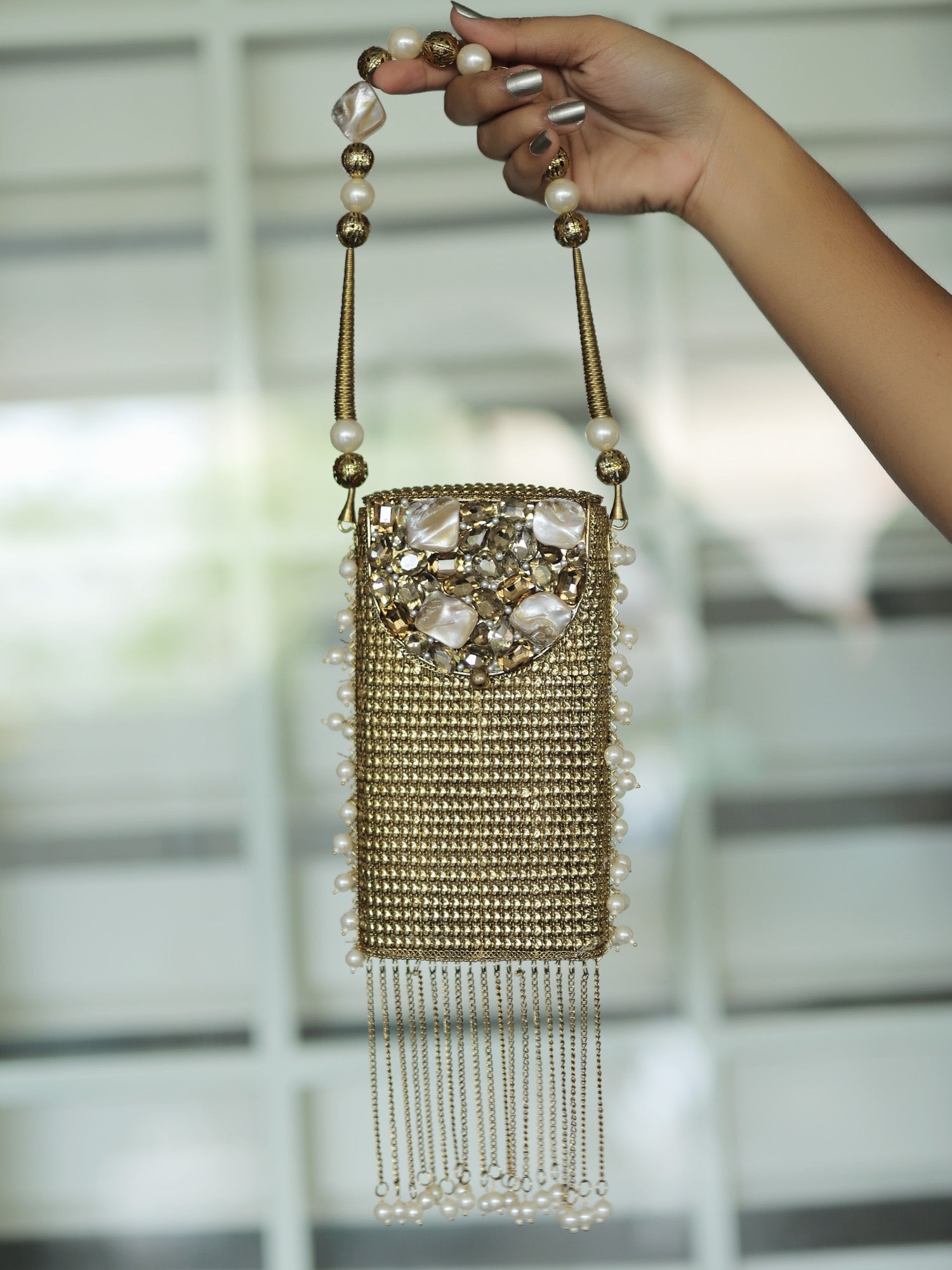 Veeksha Golden Mobile Pouch