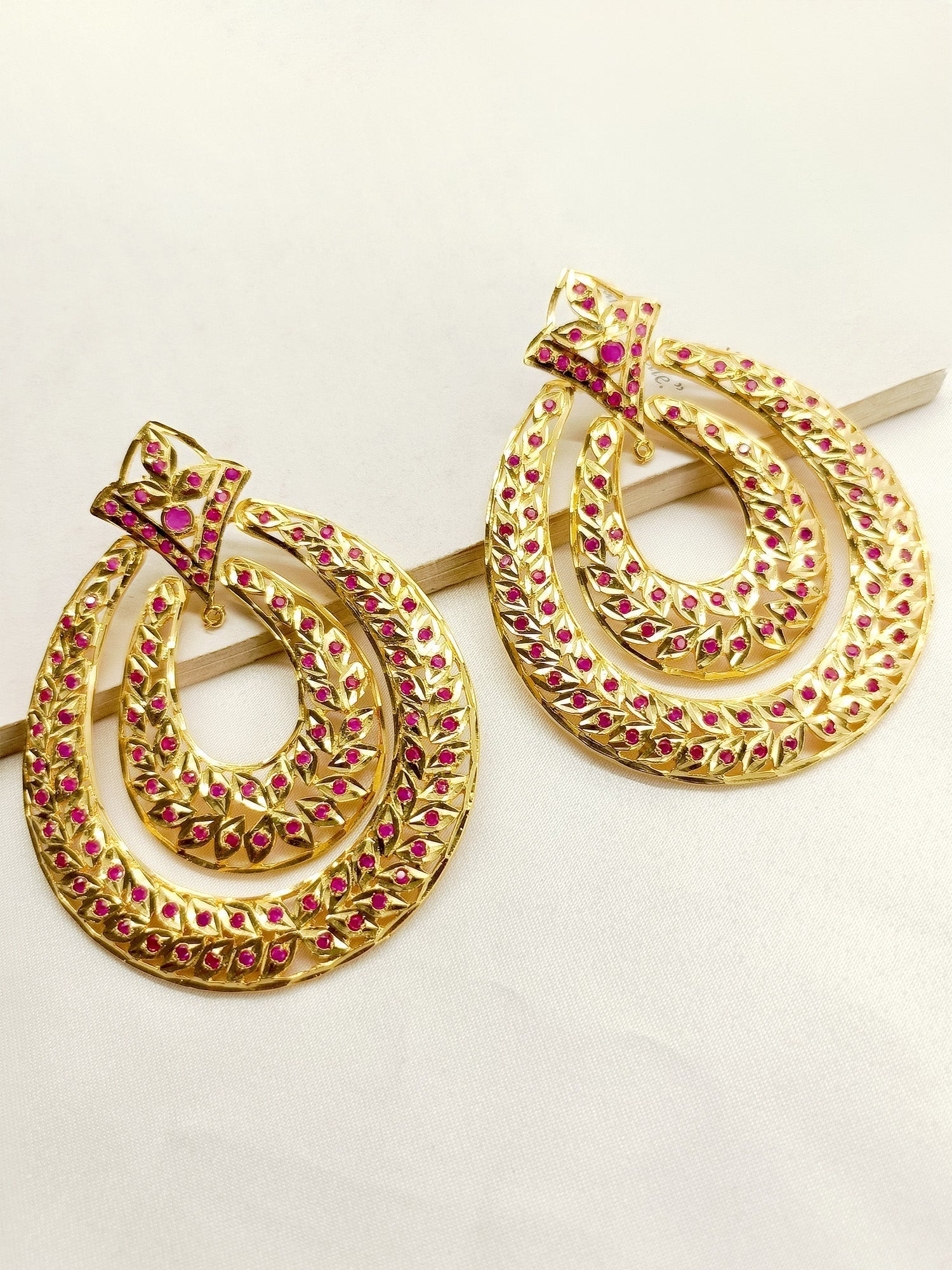 Gold plated brass Jadau earrings with delicate ruby stones