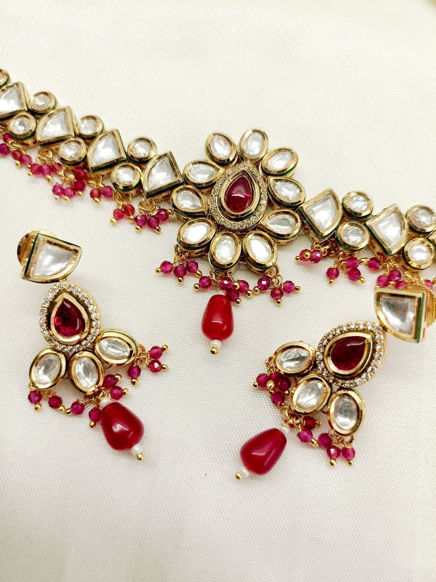 Exquisite and traditional Dhanshika Ruby Kundan Necklace Set with intricate Kundan and ruby design