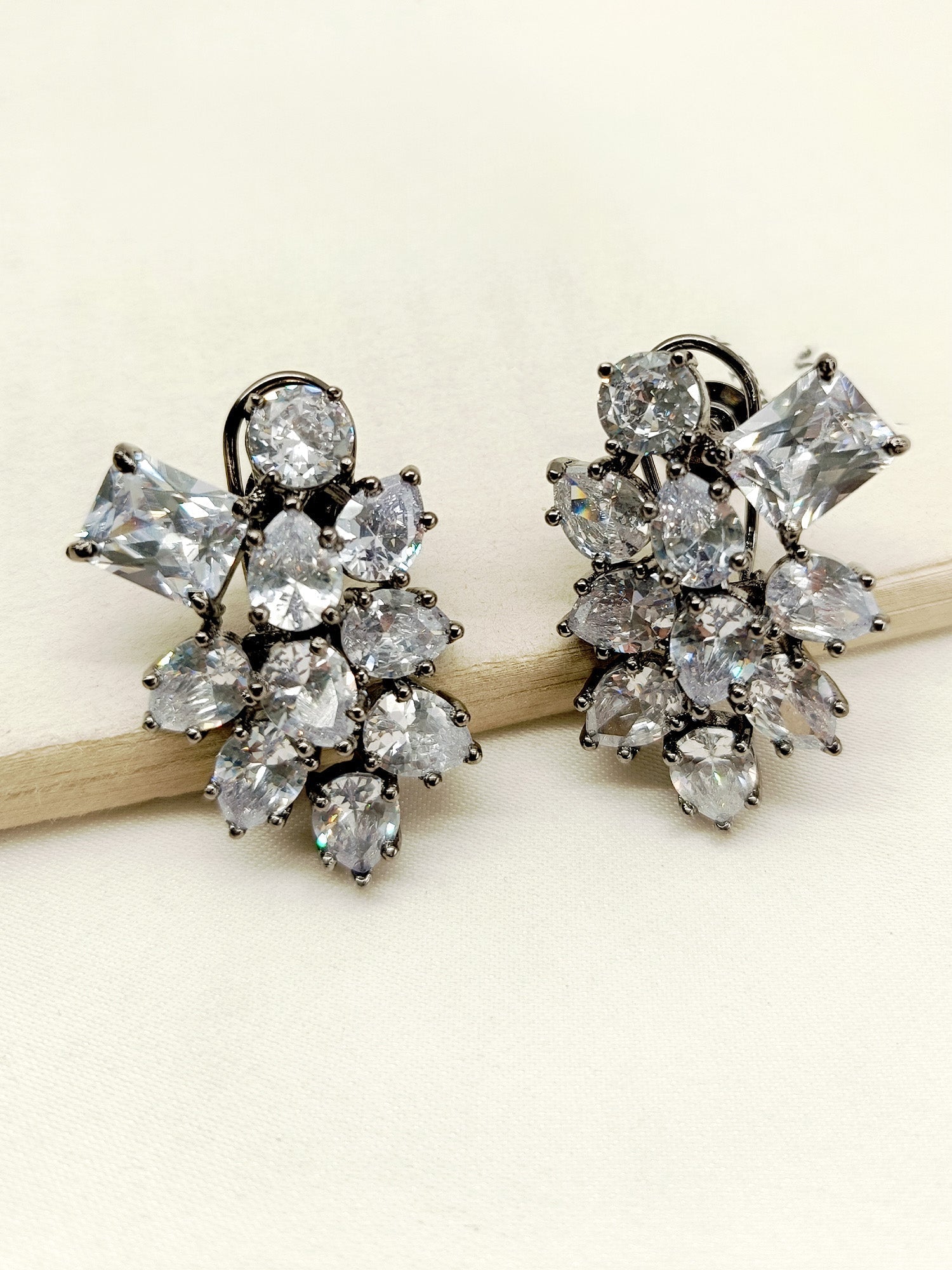 Rhodium plated brass metal Victorian tops with stunning American diamond accents