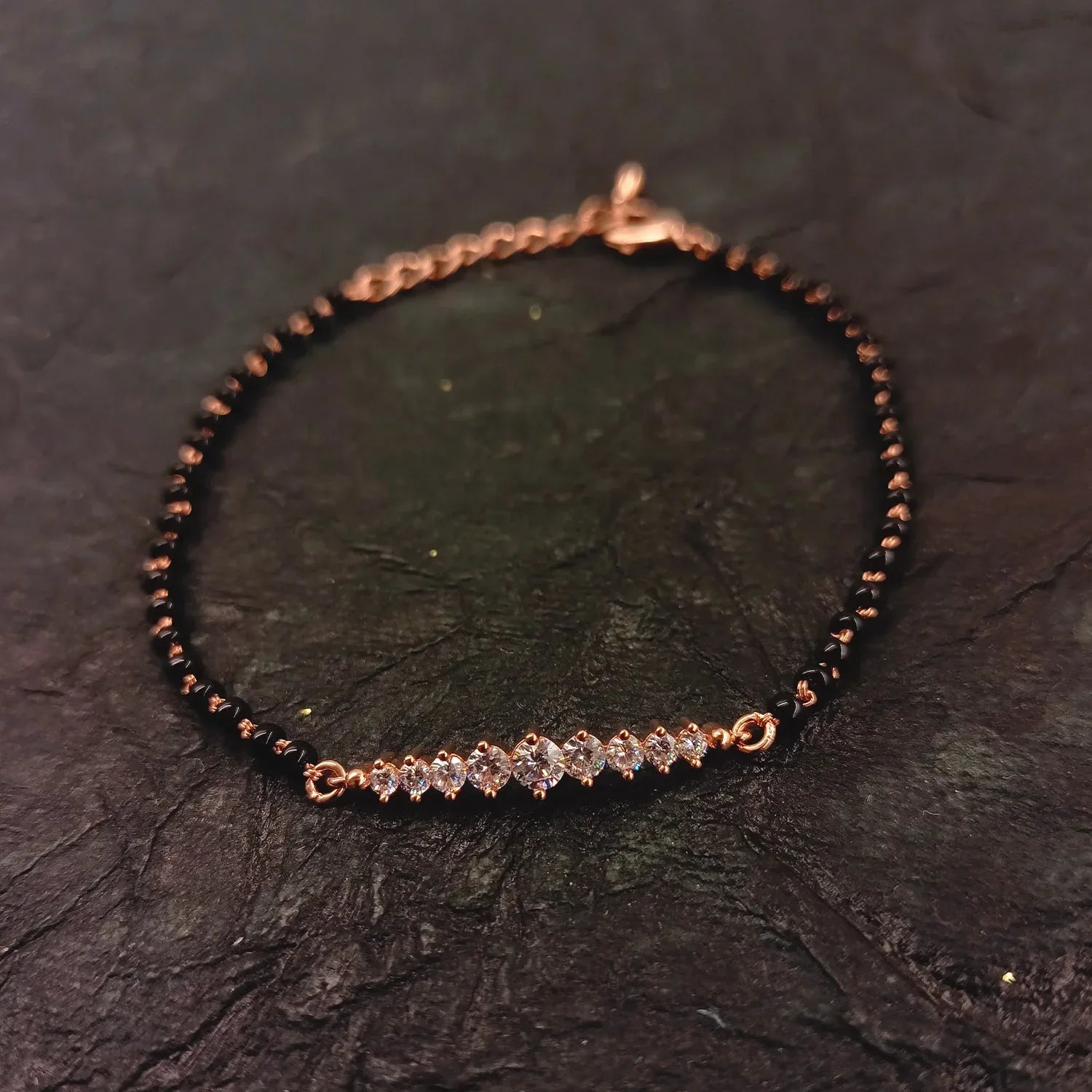 Sharmila Diamond Piece With Black Beads Rose Plated Hand Mangal Sutra