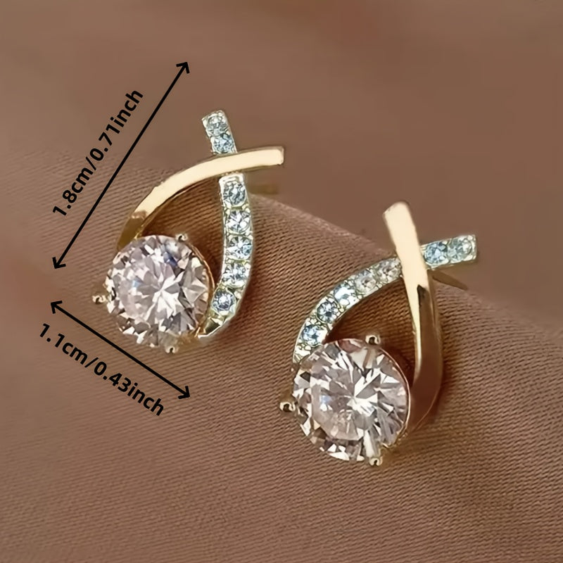 Oorbellen met gouden kruis en zirconia - By Qivii