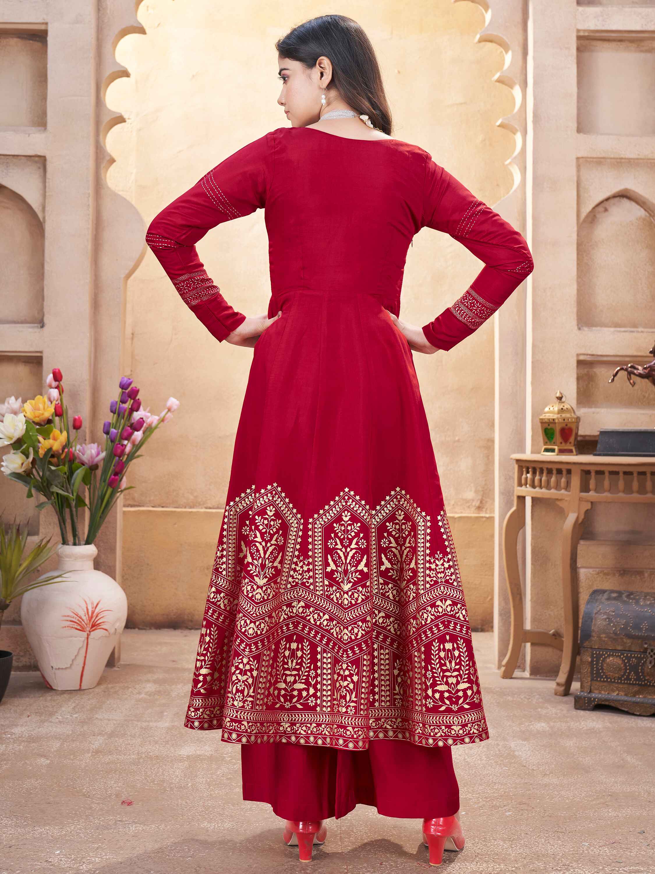 Matching palazzo and silk dupatta create a sophisticated, cohesive look