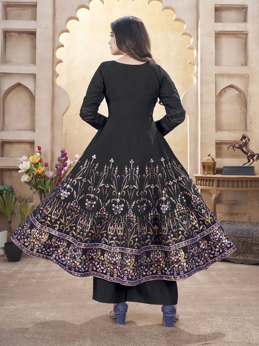 Black Roman Silk Mirror Work and Foil Print Salwar Suit top fabric Roman Silk bottom fabric Roman Silk dupatta fabric Roman Silk size ready to wear stiched M-38 & XL-42 work Mirror Work and Foil Print dupatta work Foil Print top length 50 inch bottom length 39 inch dupatta length 230 MTR