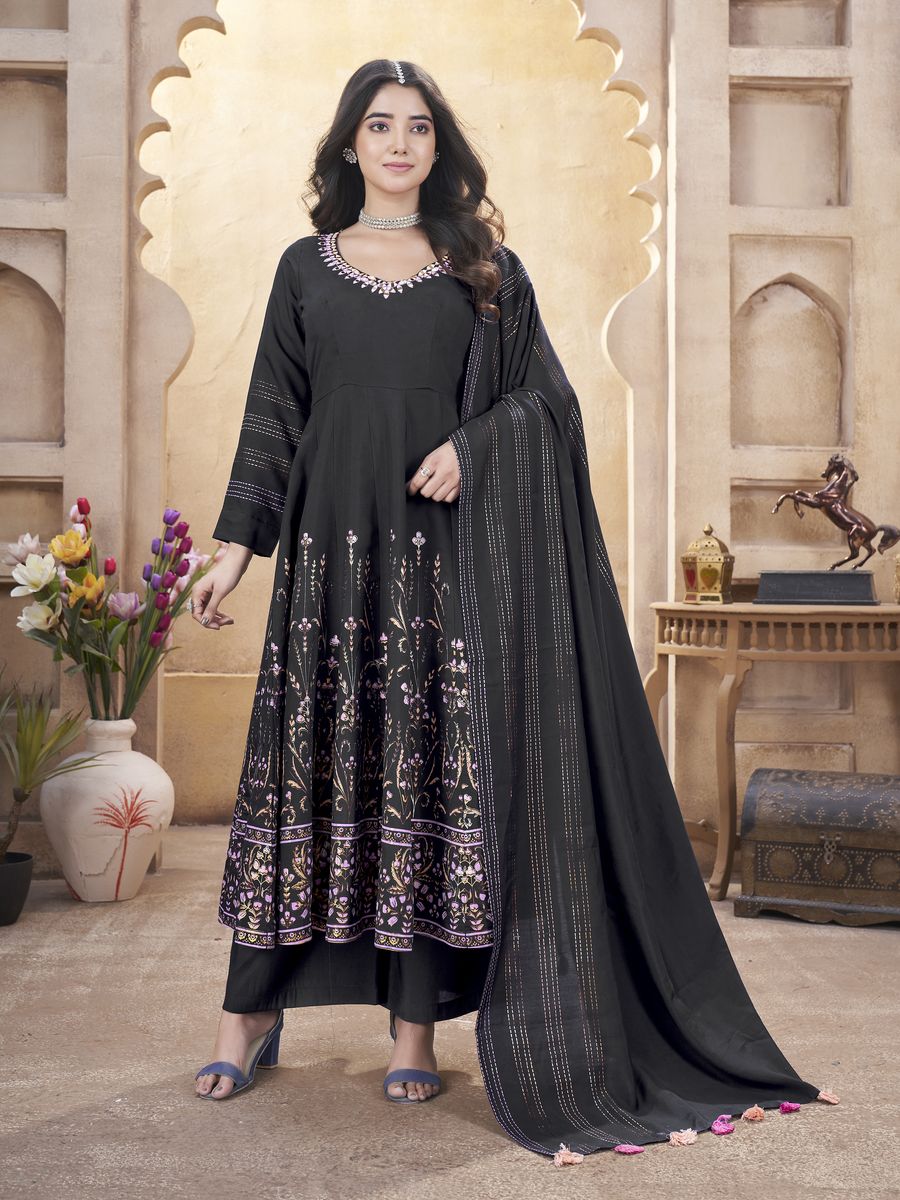 Black Roman Silk Mirror Work and Foil Print Salwar Suit top fabric Roman Silk bottom fabric Roman Silk dupatta fabric Roman Silk size ready to wear stiched M-38 & XL-42 work Mirror Work and Foil Print dupatta work Foil Print top length 50 inch bottom length 39 inch dupatta length 230 MTR