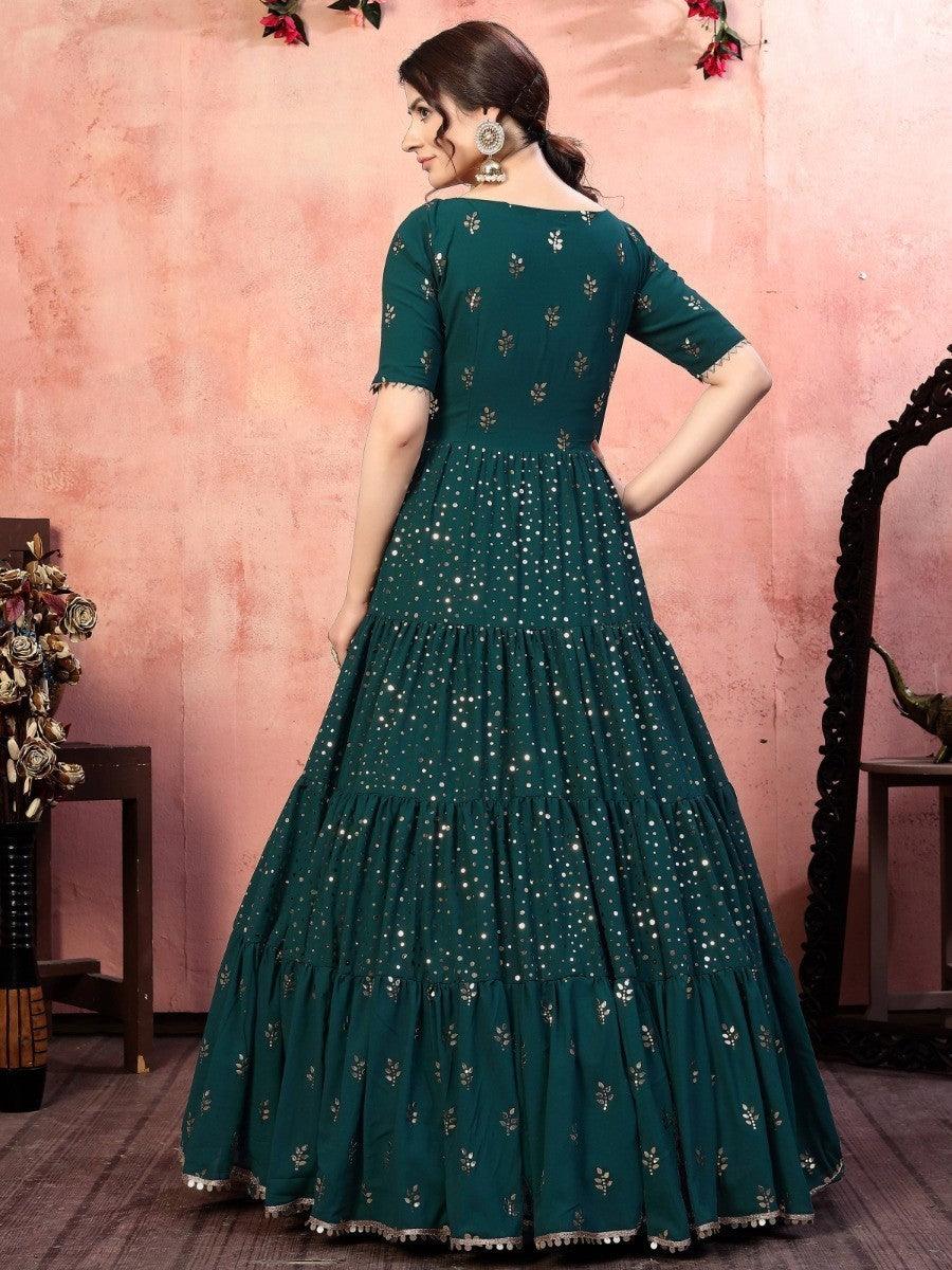 Charming green-colored anarkali gown with stylish accessories