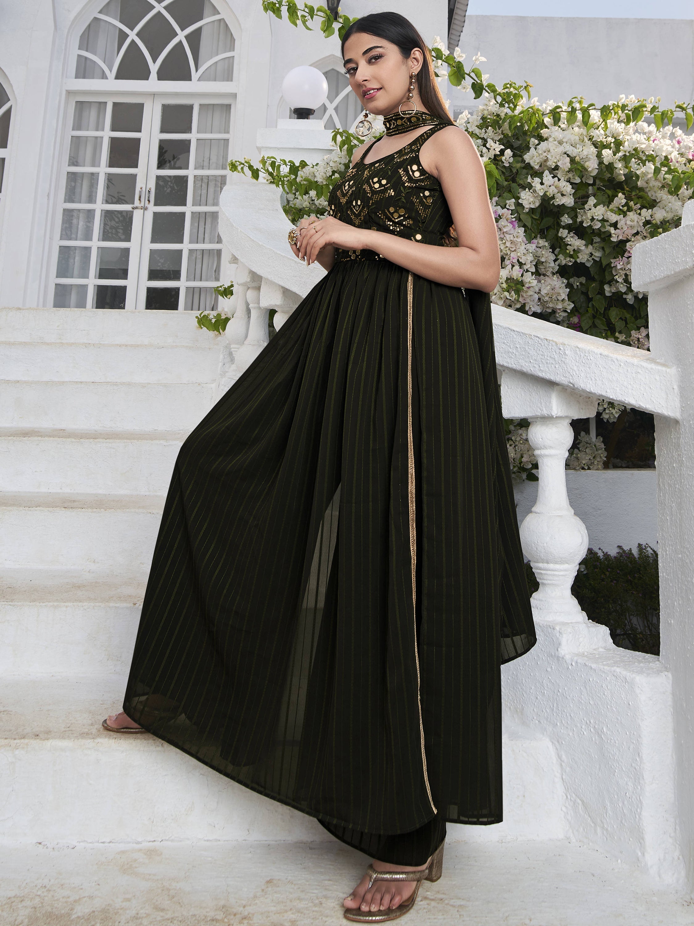 A beautiful green georgette salwar kameez with intricate embroidery for weddings