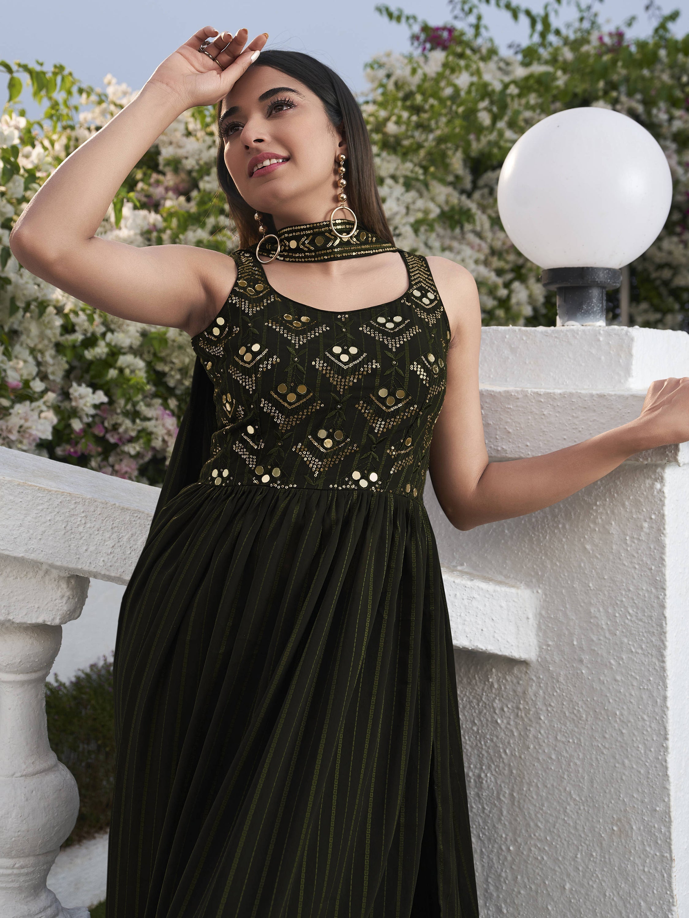 A beautiful green embroidered georgette salwar kameez for wedding wear