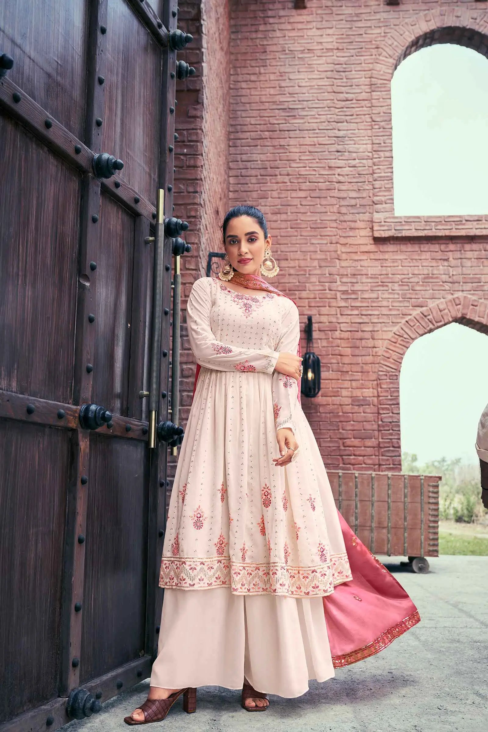 Chiku Pink Georgette Palazzo Salwar Suit With Thread And Sequins Embroidered Work