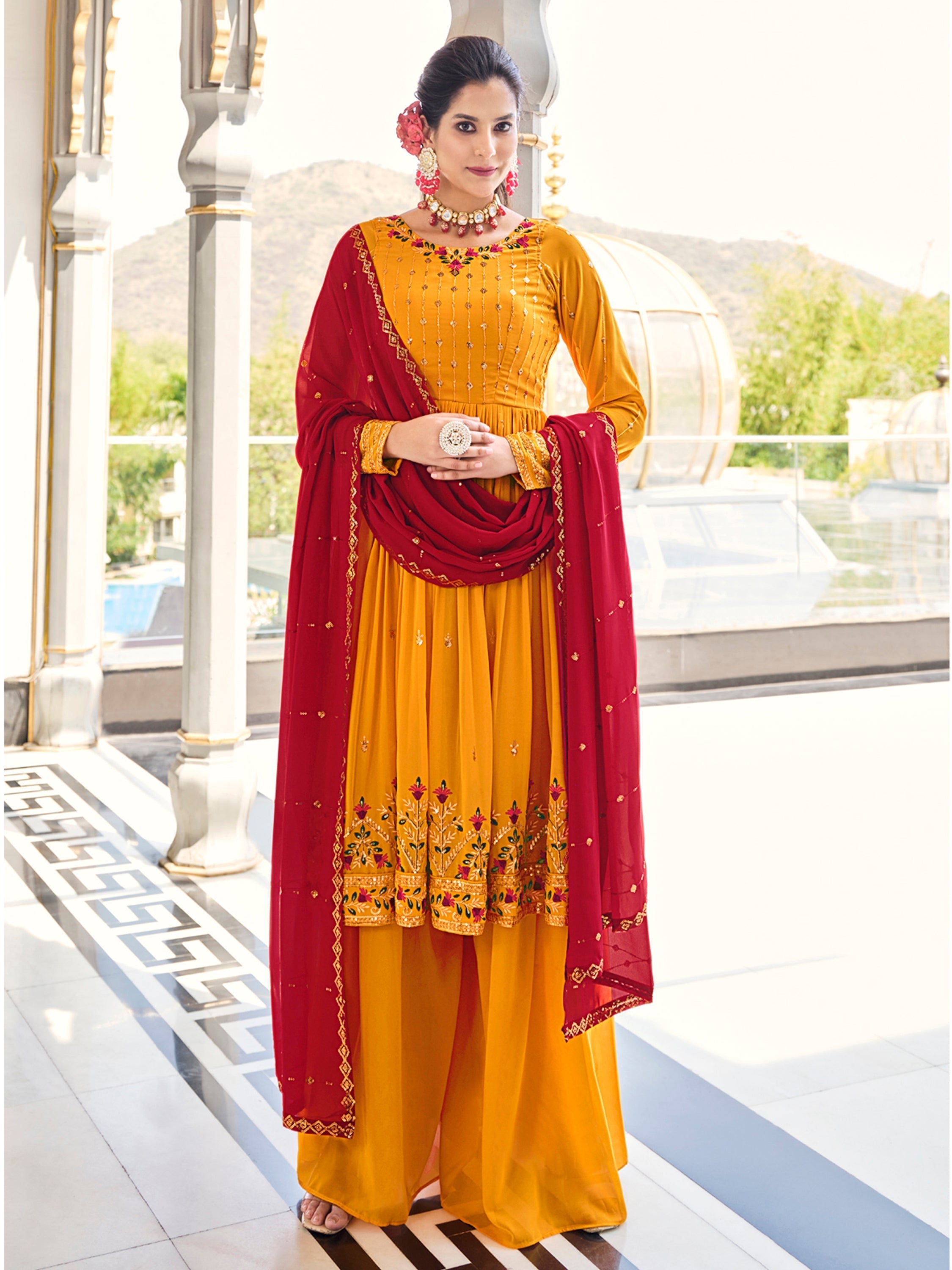 Red georgette dupatta with embroidered sequin border work, adding a pop of color and sophistication