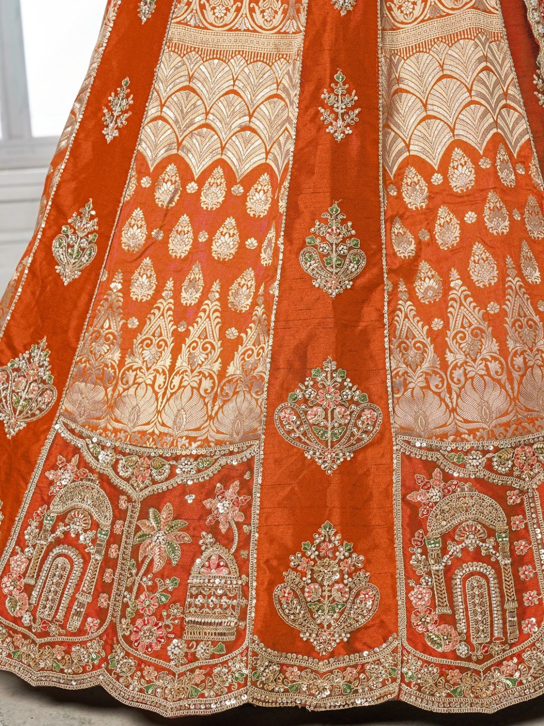 Elegant Rust Lehenga Featuring Rich Raw Silk and Artisan Craftsmanship