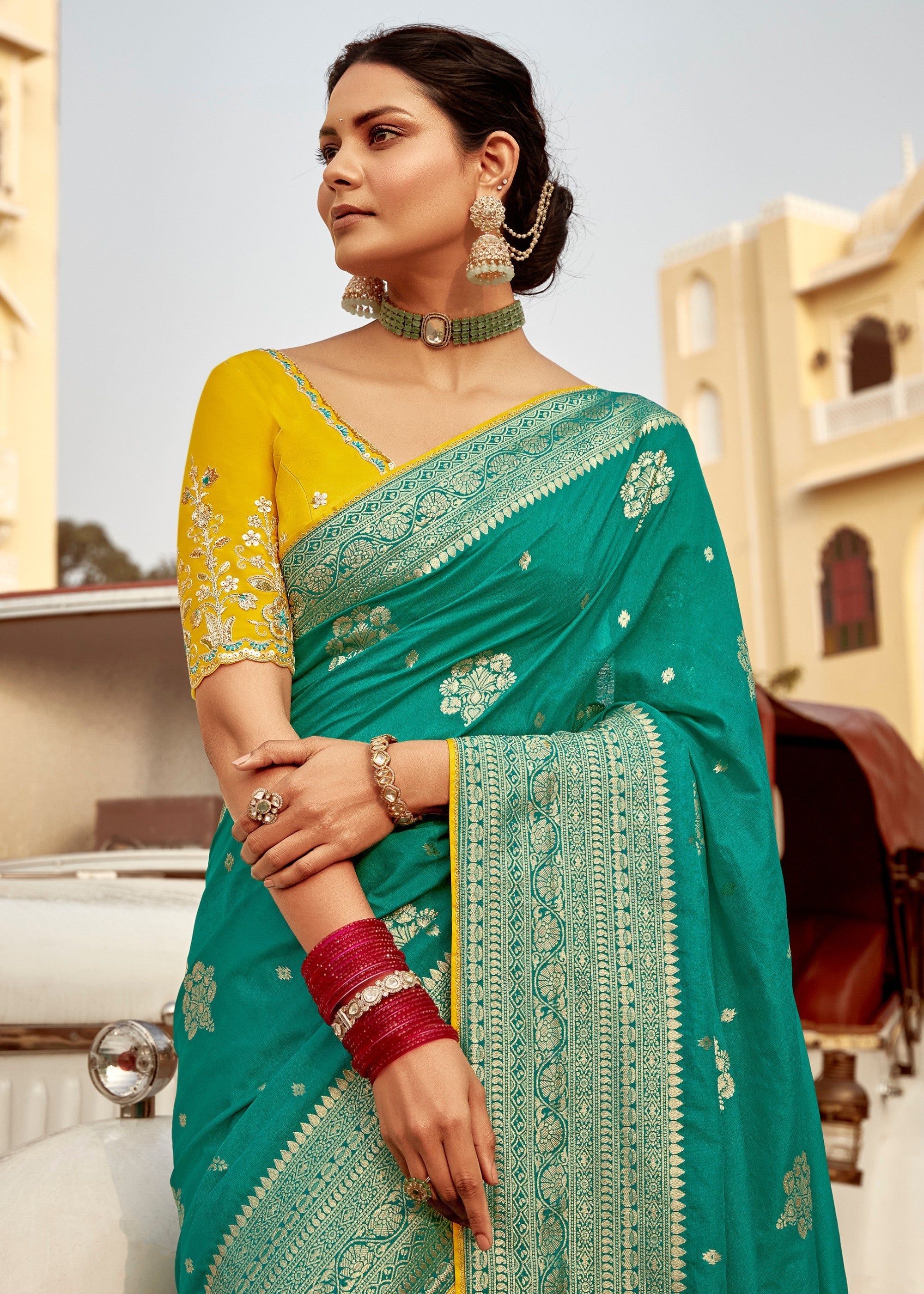 Jade Green Dola Silk Saree Embellished With Weaving Work And Heavy Embroidered Blouse - qivii
