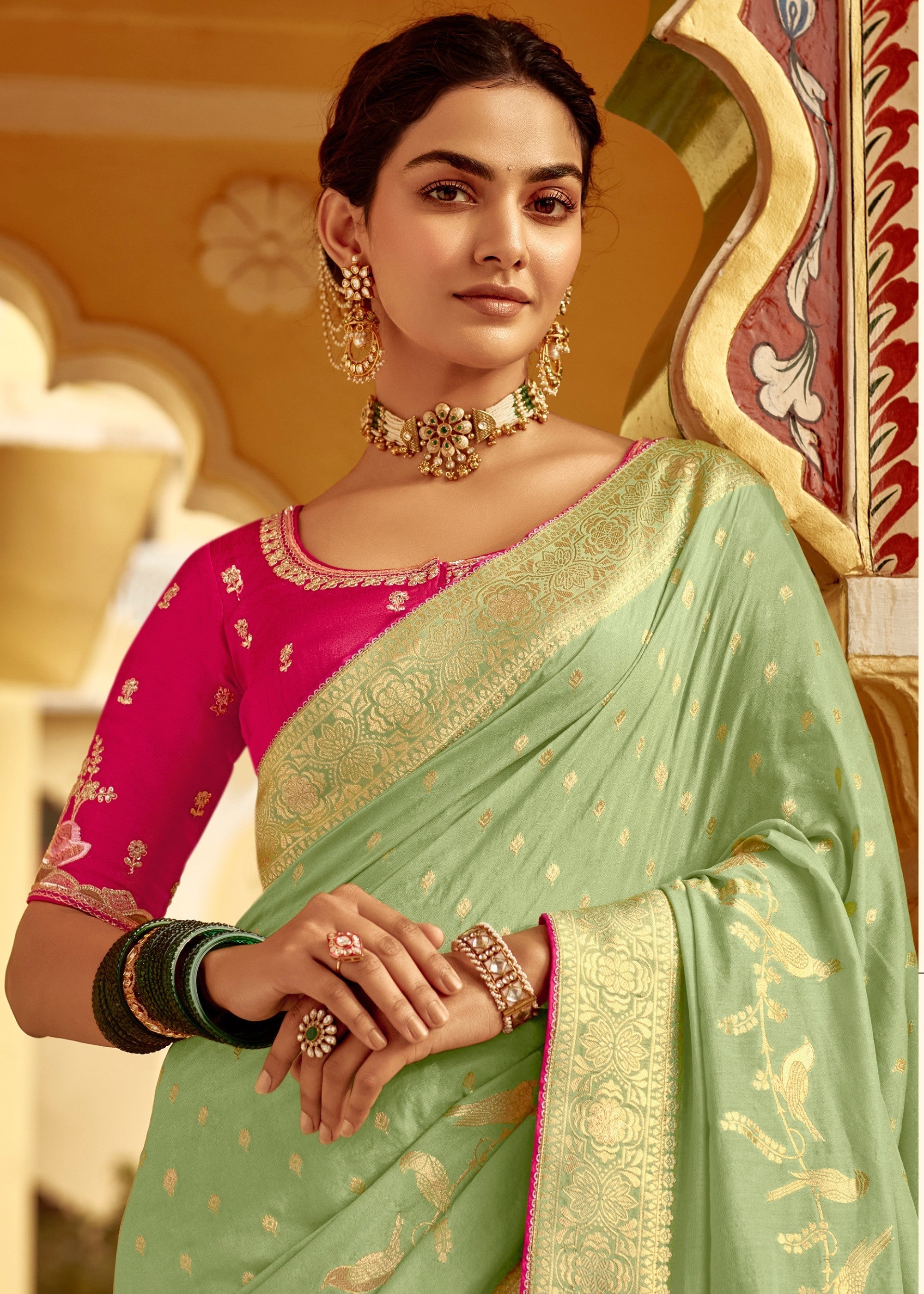 Pistachio Green Dola Silk Saree Embellished With Weaving Work And Heavy Embroidered Blouse - qivii