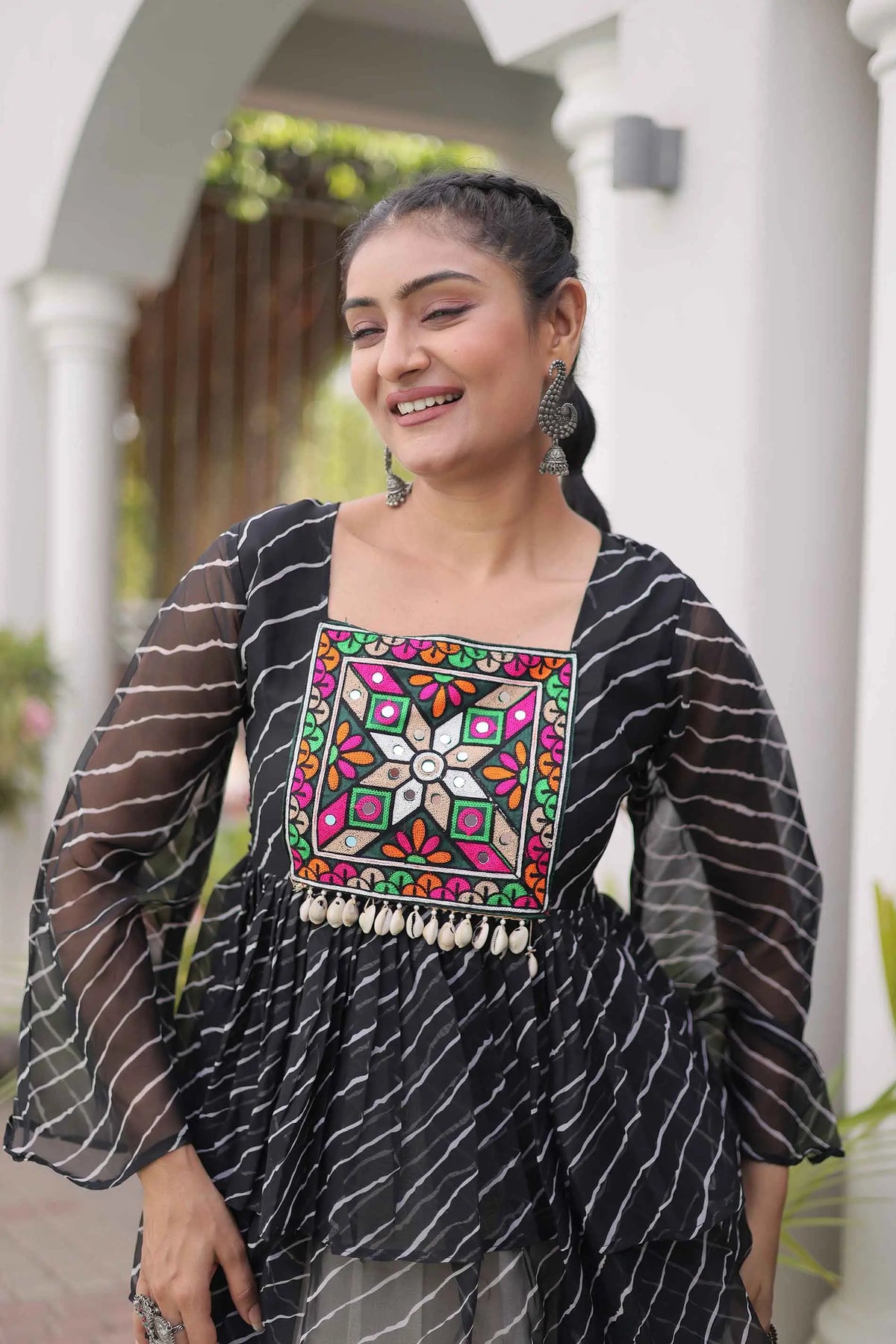 Black Peplum Style Blouse And Lehenga