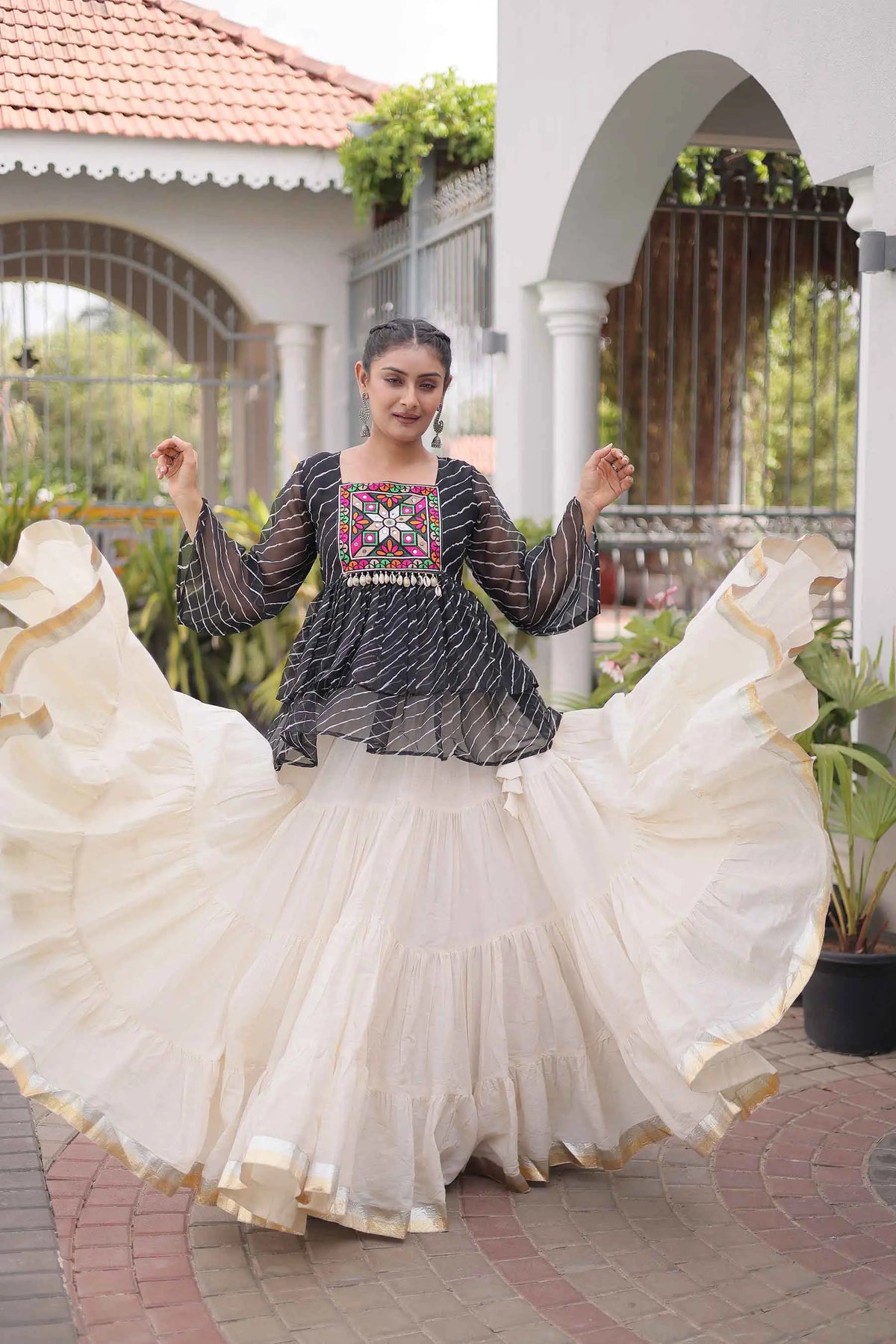 Black Peplum Style Blouse And Lehenga