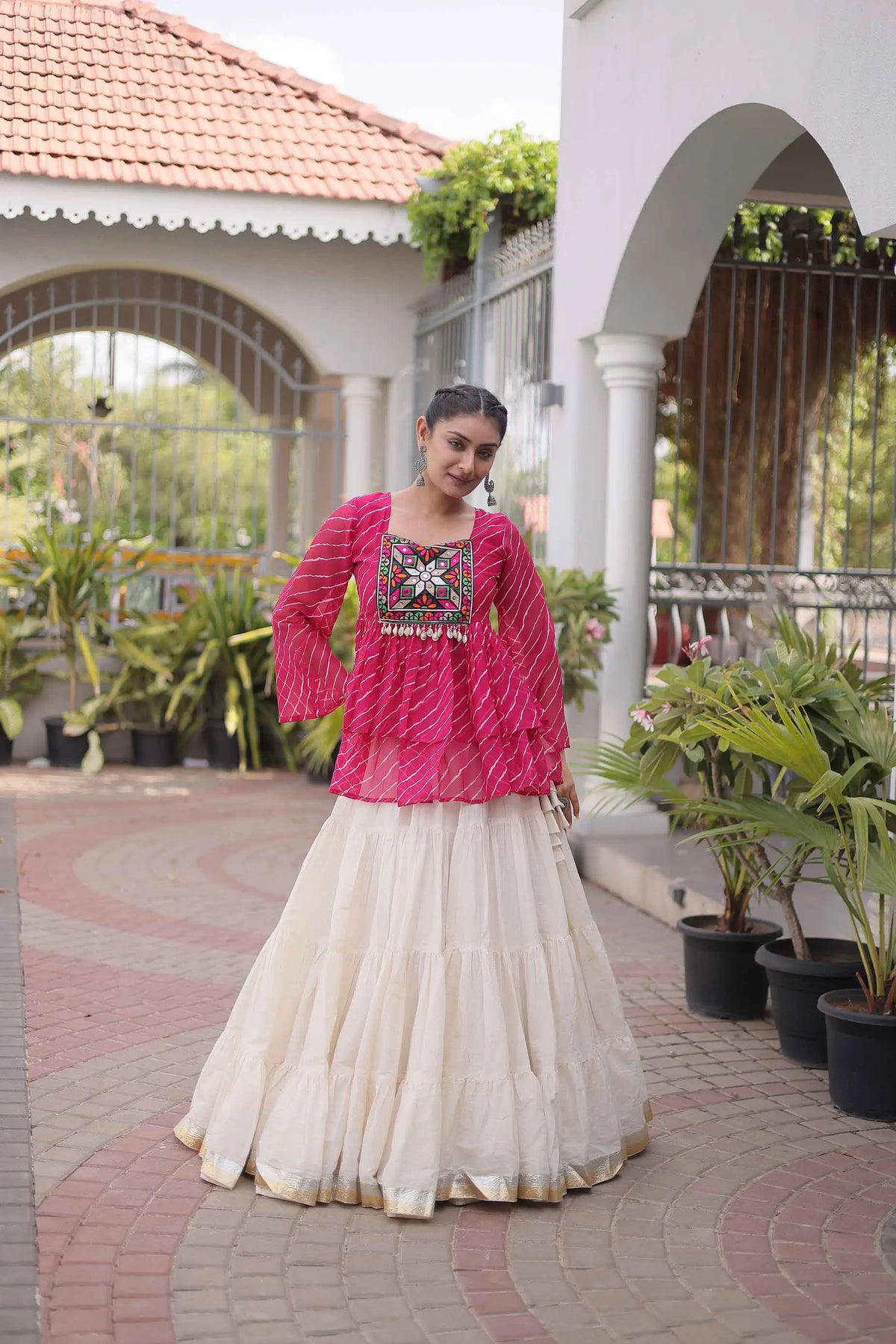 Pink Peplum Style Blouse And Lehenga