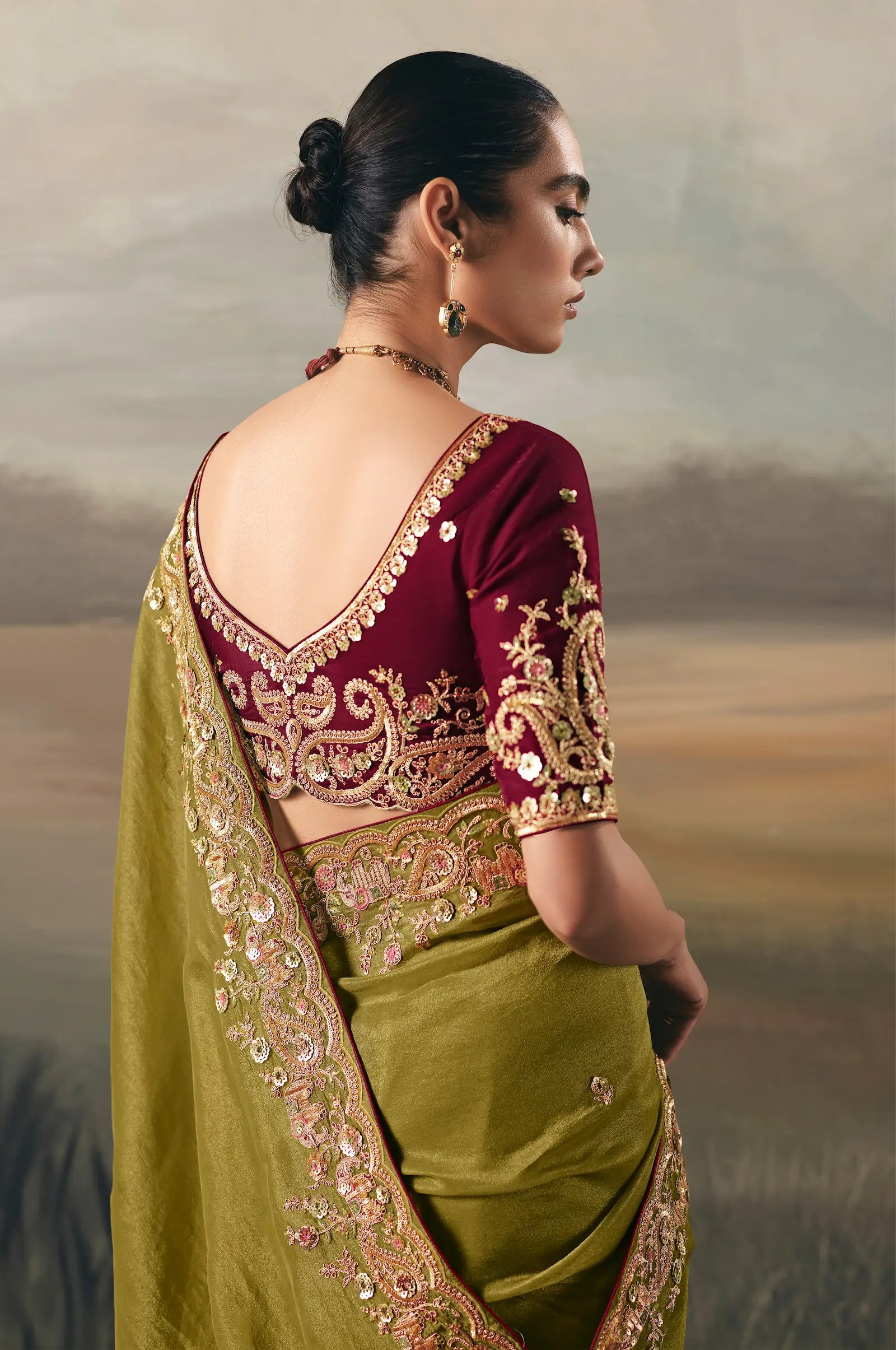 Parrot Green Heavy Embroidered Tissue Silk Saree