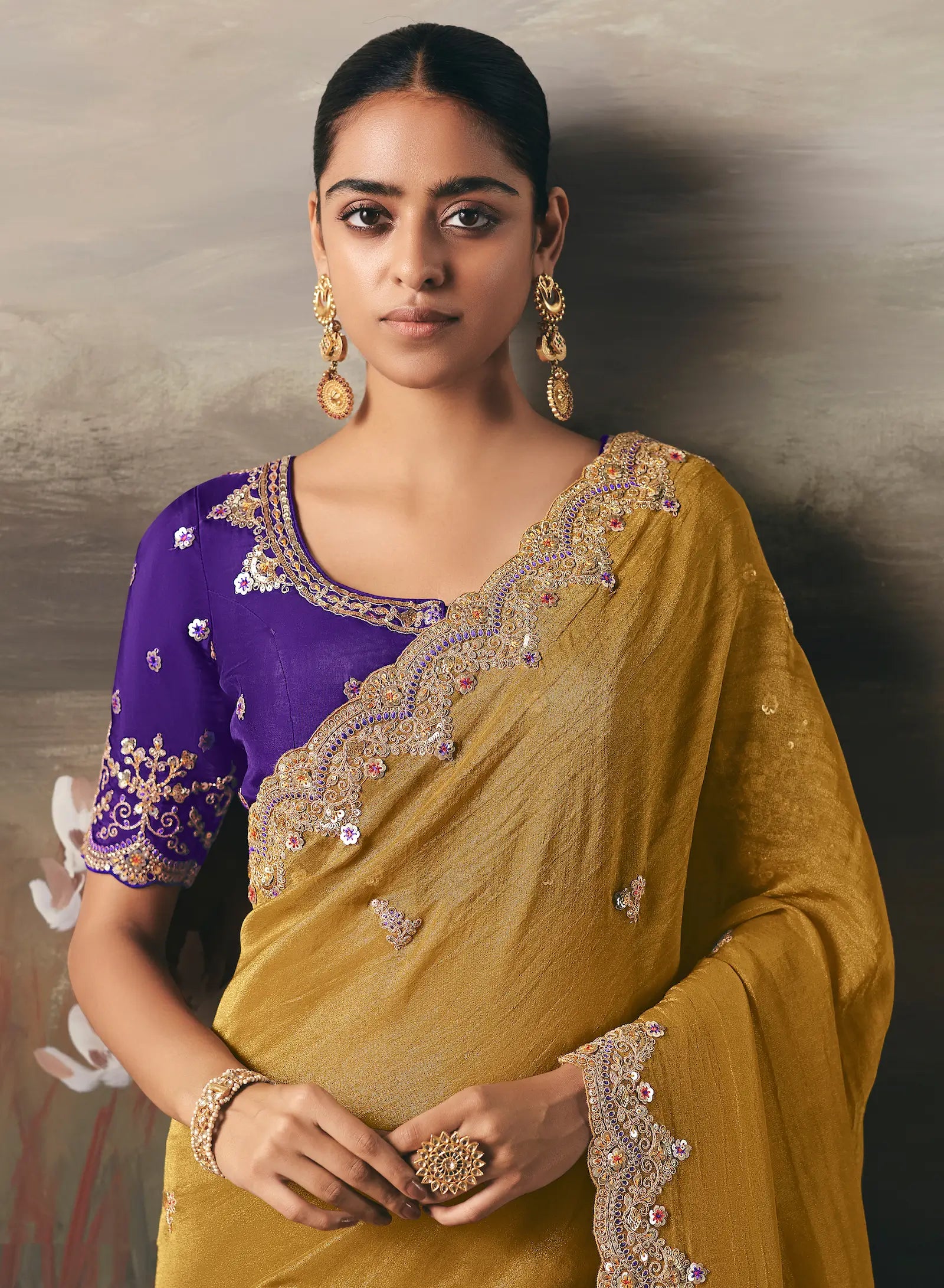 Turmeric Yellow Heavy Embroidered Tissue Silk Saree