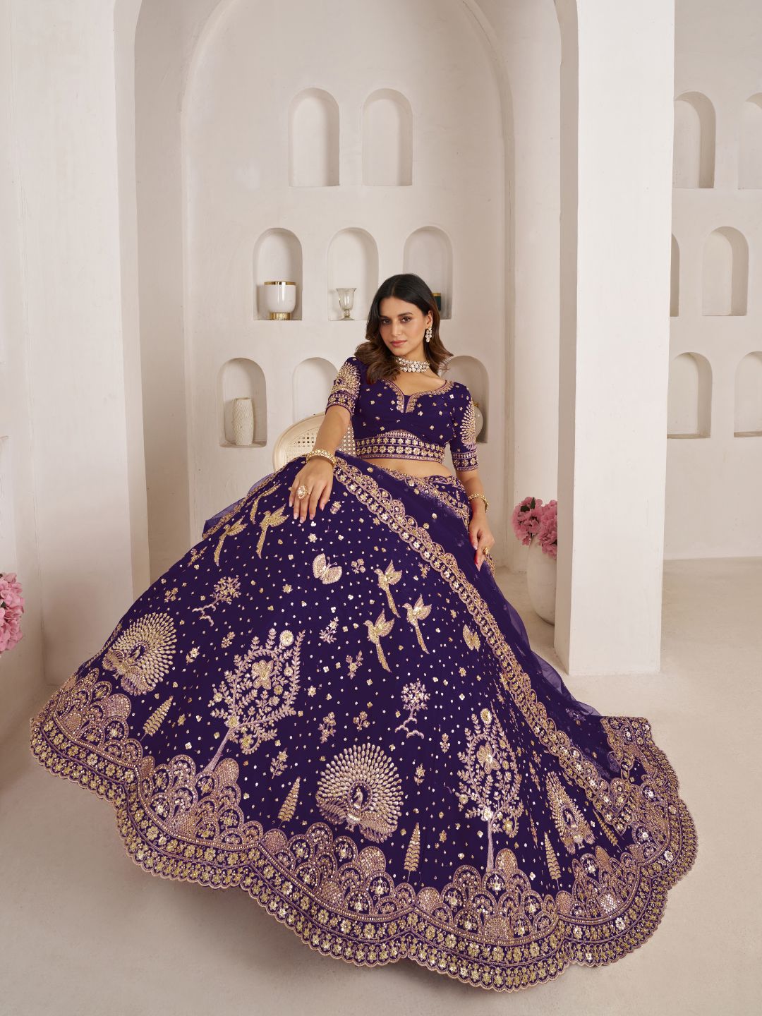 Luxurious Purple Lehenga Featuring Intricate Floral and Bird Designs