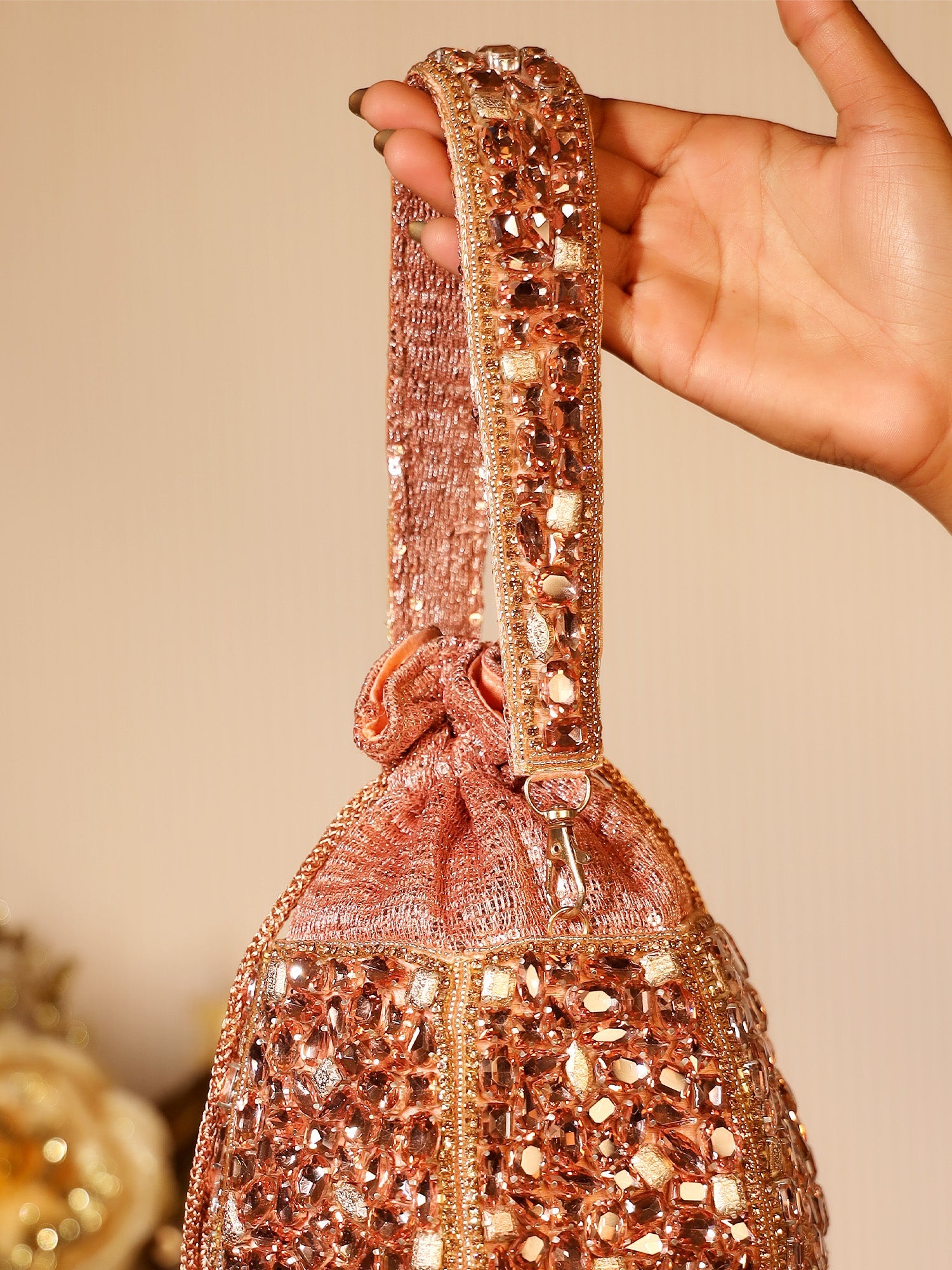 Ambre Rose Gold Diamond Work Potli Bag - qivii