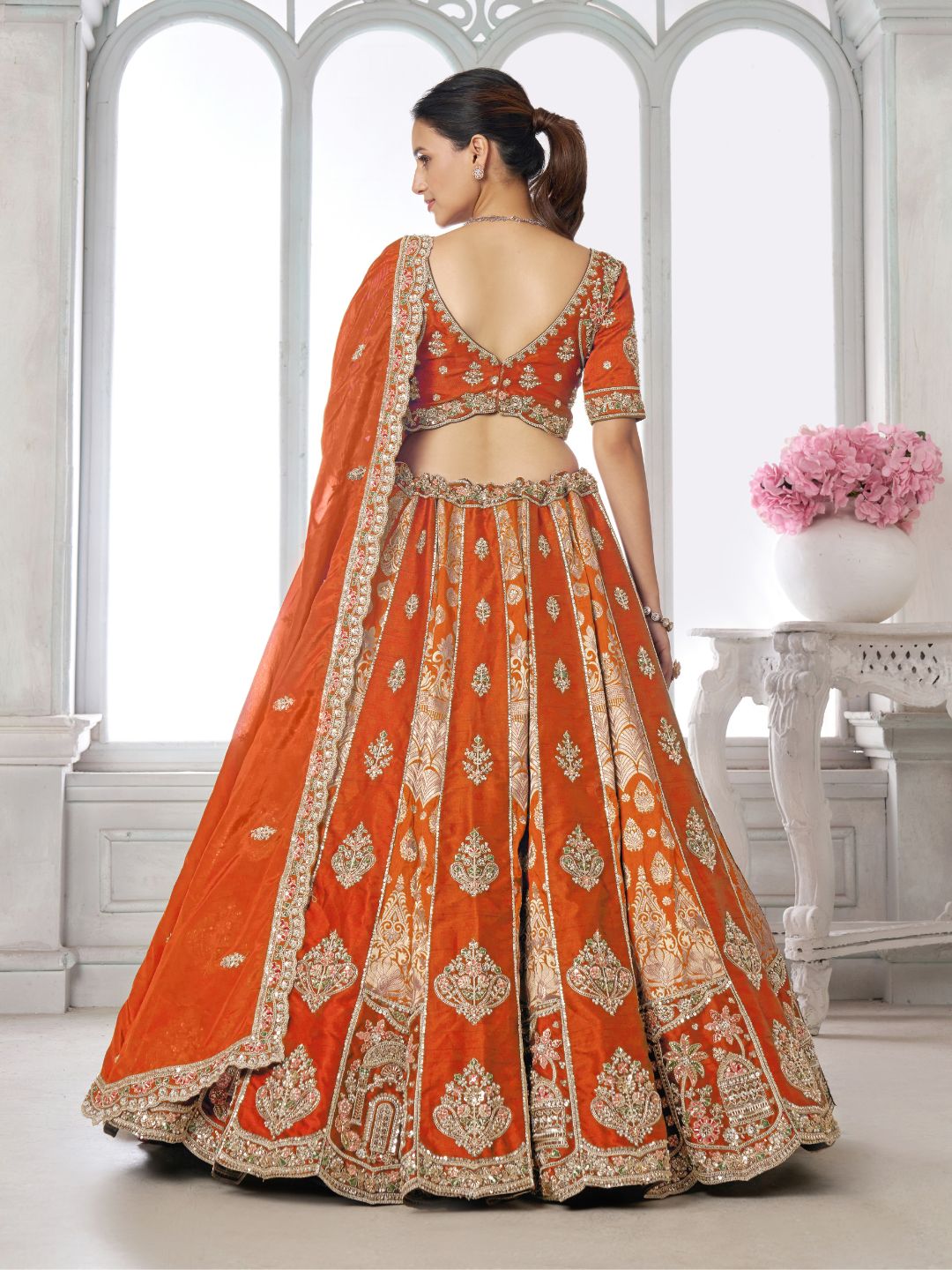 Elegant Rust Lehenga Featuring Rich Raw Silk and Artisan Craftsmanship
