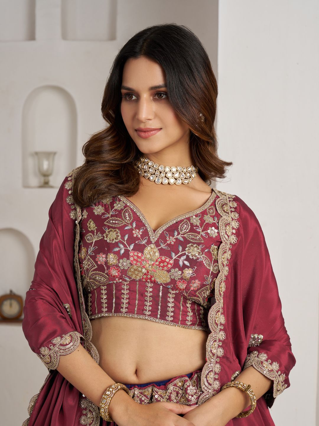 Stylish Maroon Lehenga Choli with Rich Golden Floral Craftsmanship