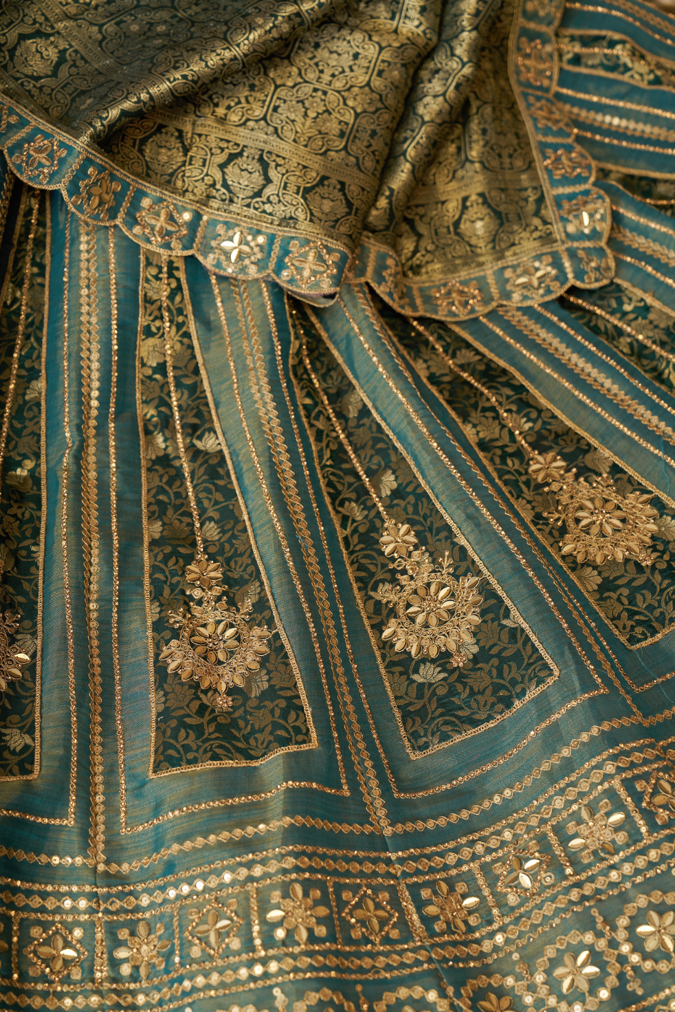 Regal Green Tissue Base Bridal Lehenga with Banarasi Patches and Zari Work - qivii