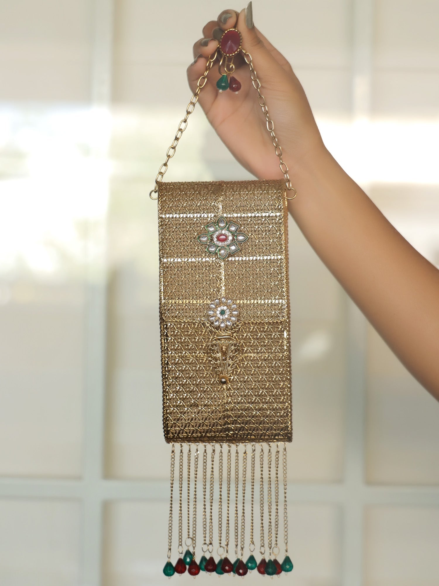 Shristi Golden Mobile Pouch - qivii