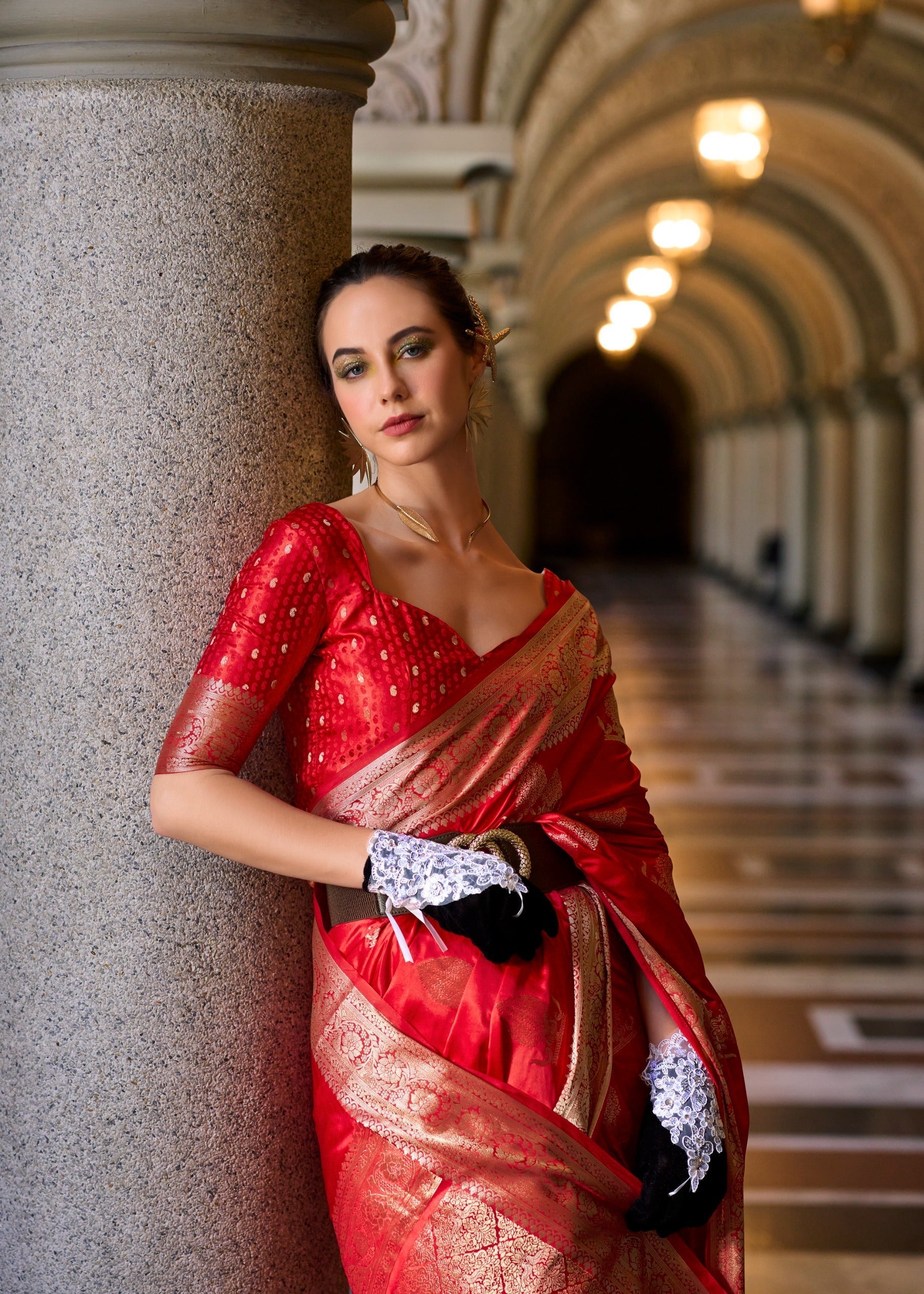 Designer Pallu with elegant detailing on Red Satin Mungha Silk Saree